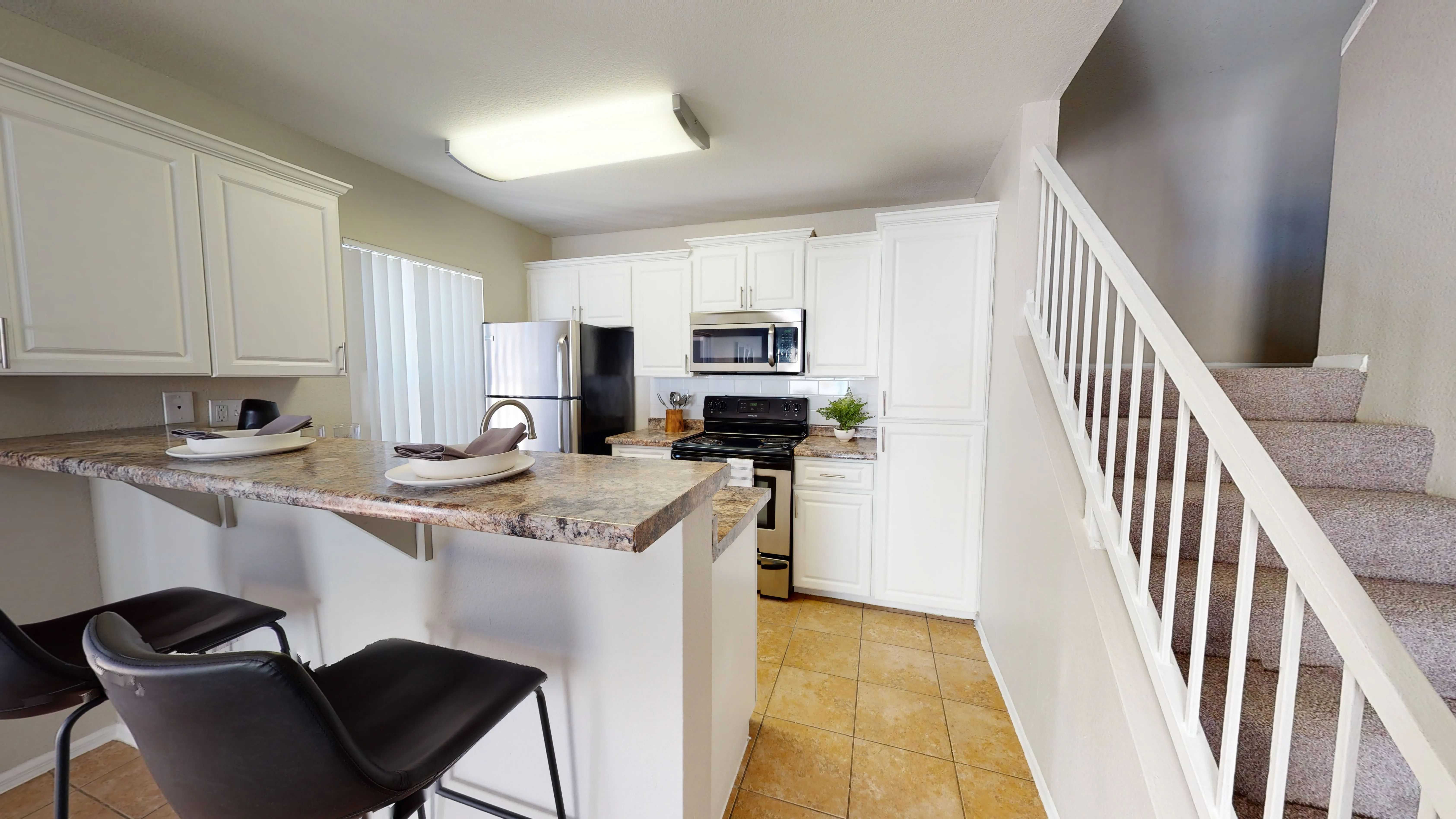 Our townhomes offer expansive kitchens with subway tile backsplashes, granite-style counters, and stainless-steel Frigidaire-brand appliances for an incredible homey feel and a space you cherish. 