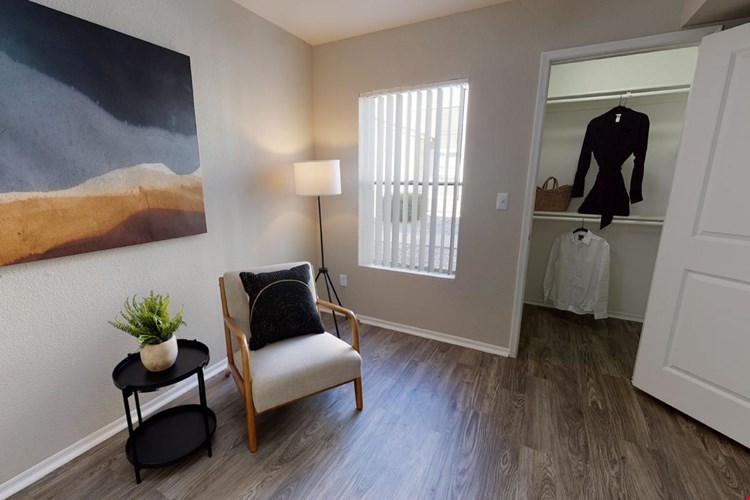 Oversized bedroom with a large walk-in closet.