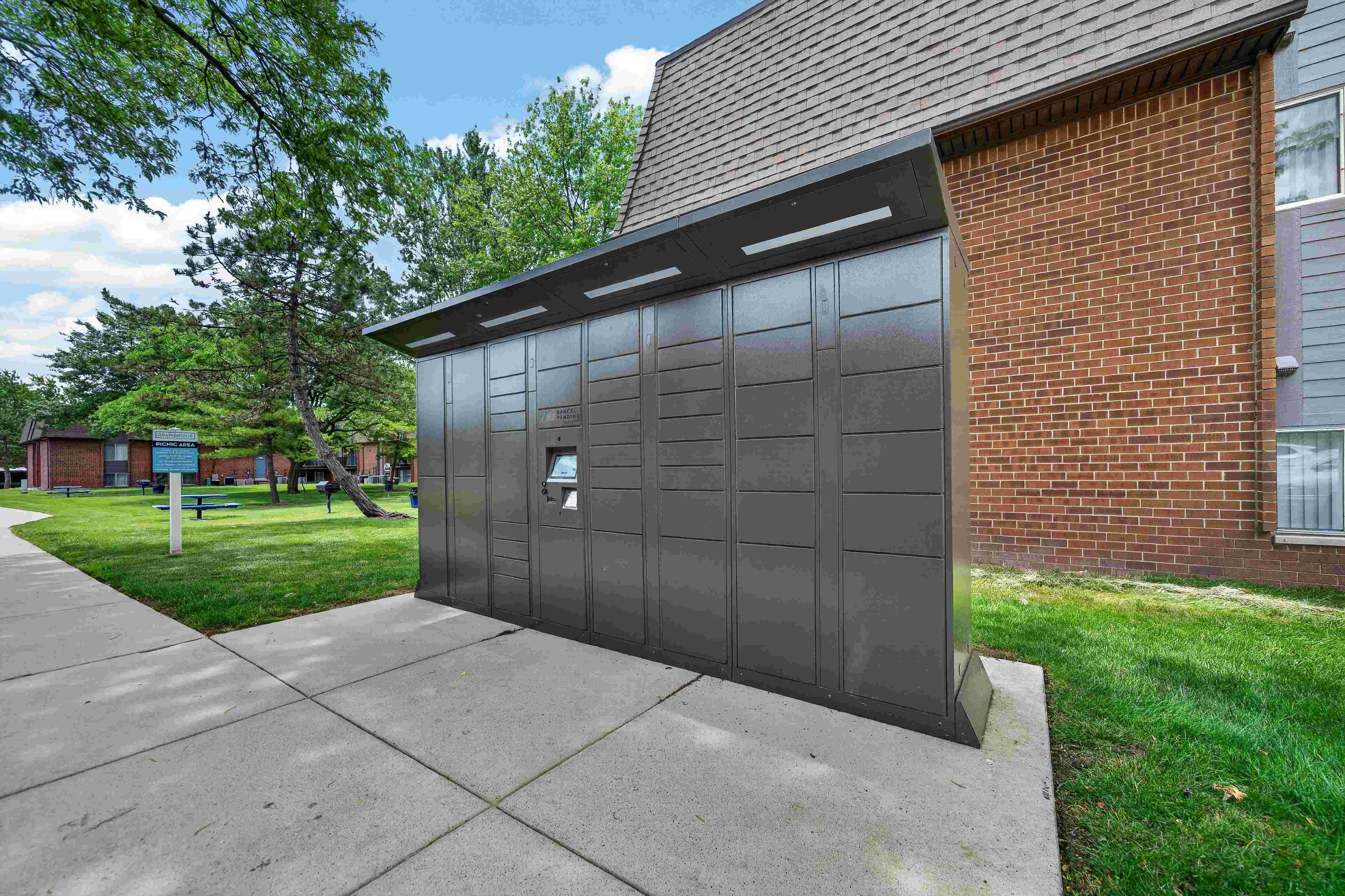 24/7 secured Package Lockers at Drawbridge Apartments East in Harrison Township, MI