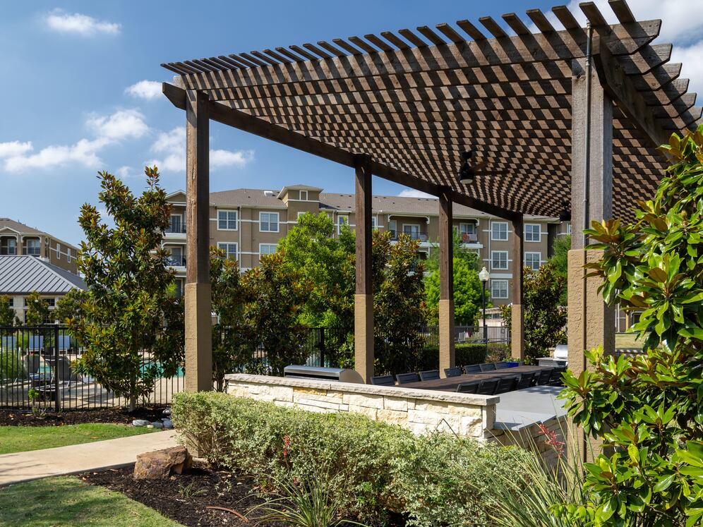 Courtyard with BBQ grills and picnic tables