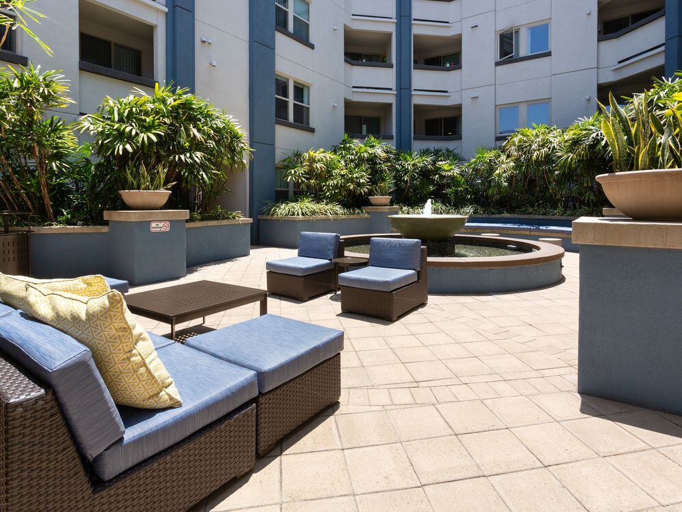 Courtyard with fountain and soft lounge seating