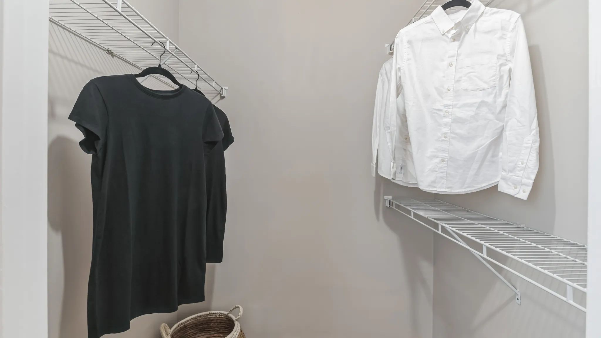 Spacious walk-in closets feature built-in organizers for organized luxury.