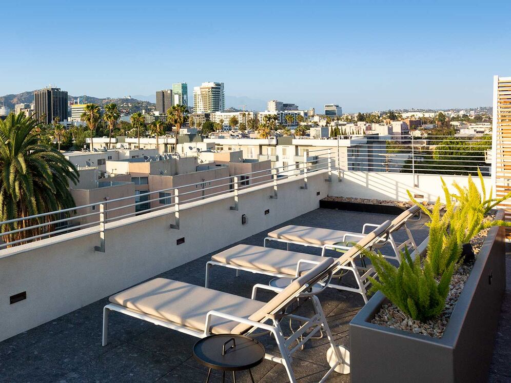 Roofdeck with lounge seating, cabanas and panoramic views