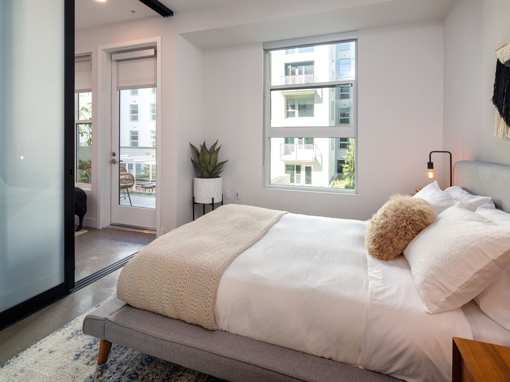Bedroom with sliding barn door
