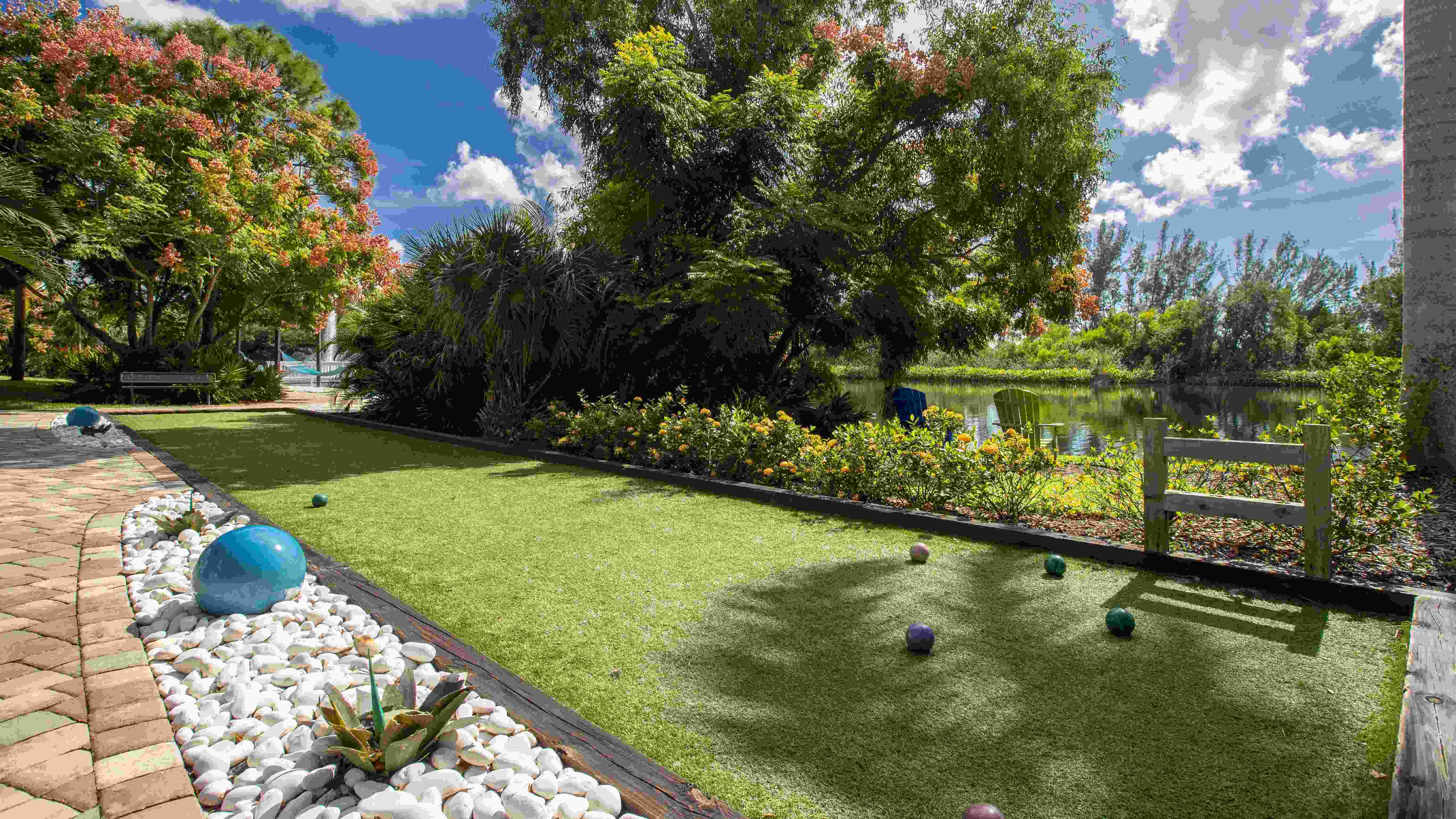 Engage in spirited bocce ball games by the lake.