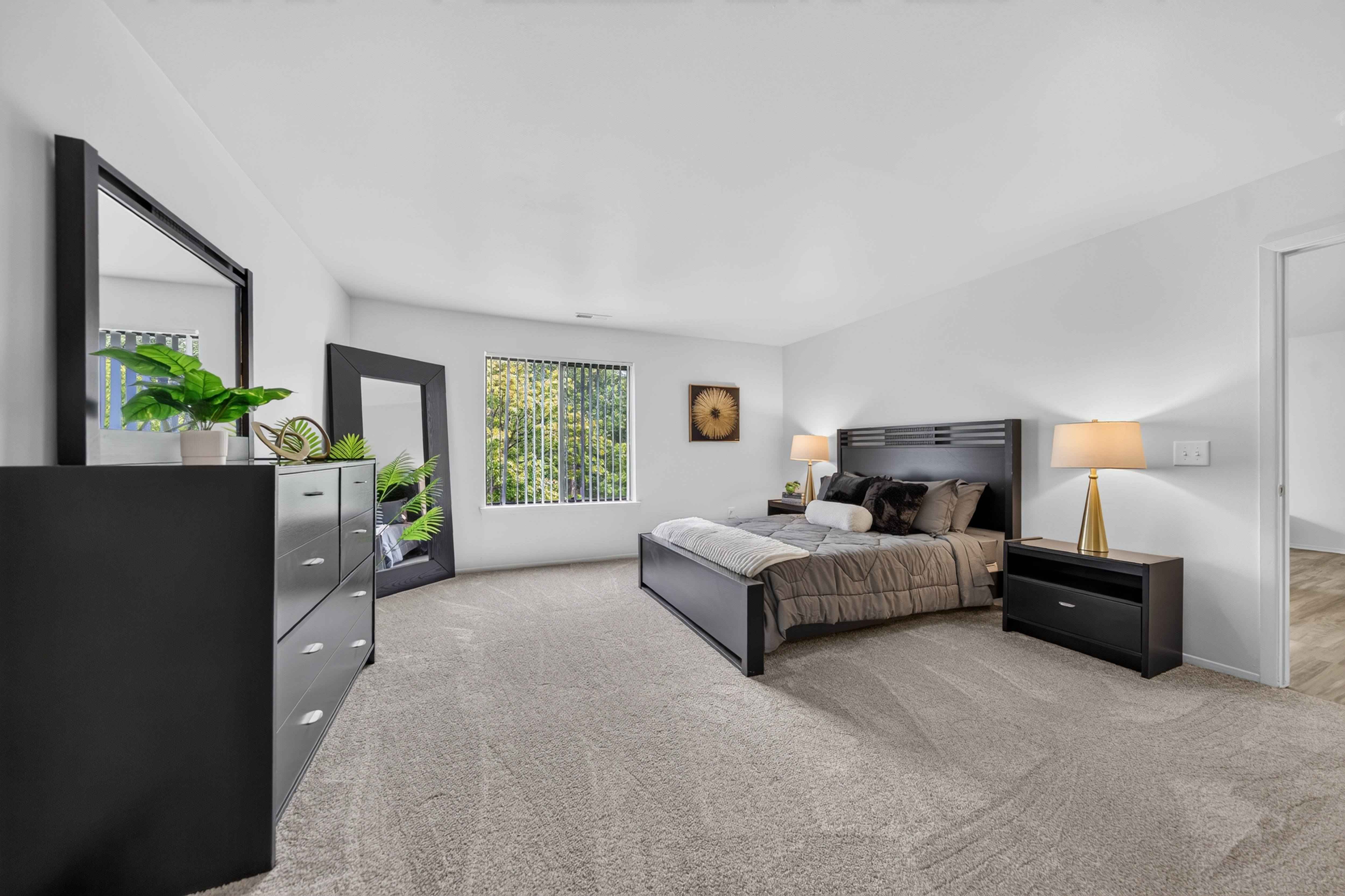 Spacious bedroom with ample storage space  at Franklin River Apartments in Southfield, MI.