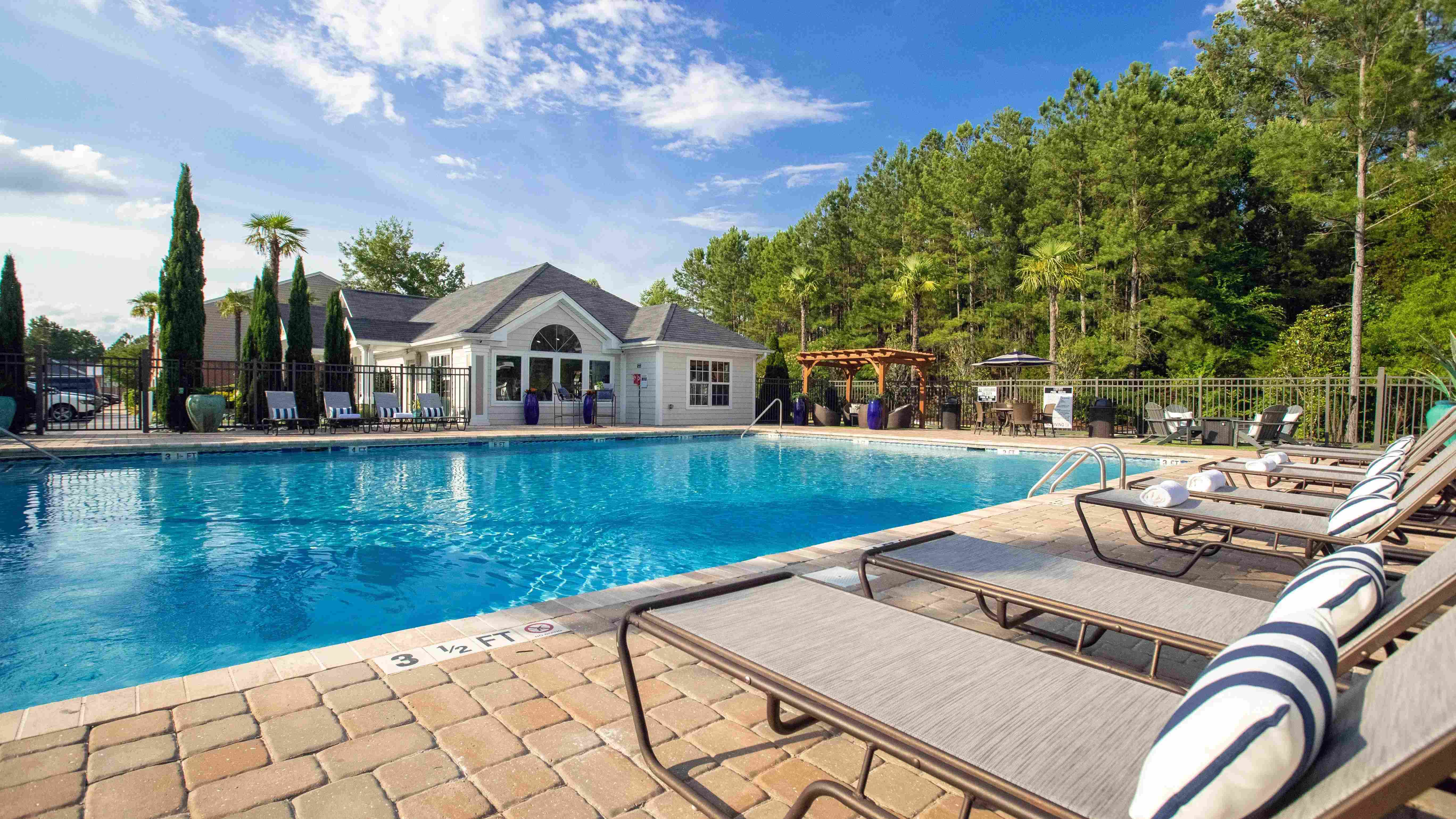 Lounge in luxury on our poolside loungers and savor the sun's warm embrace. 