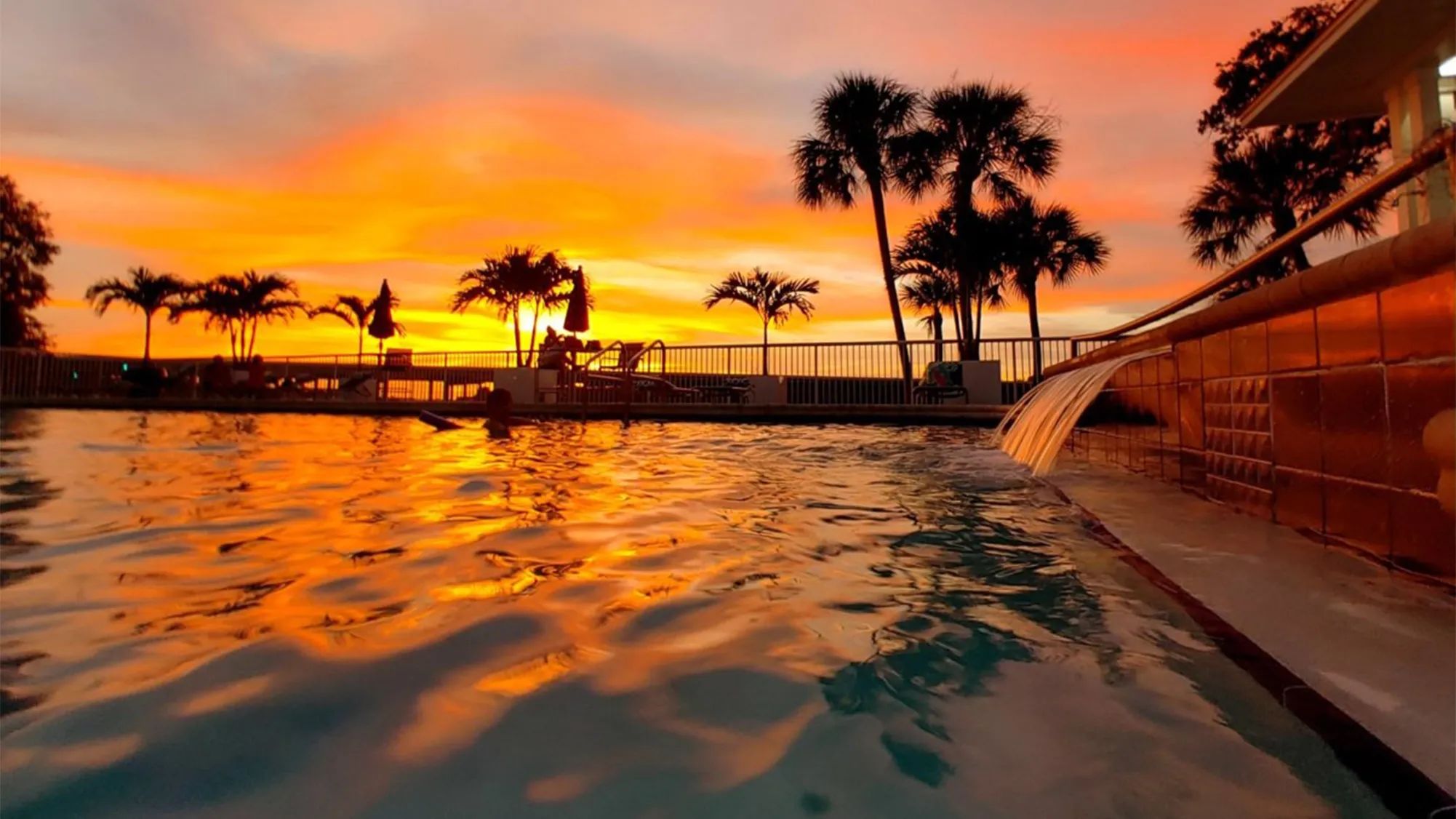 Enjoy gorgeous Florida sunsets from the waters  of our resort-style pool.