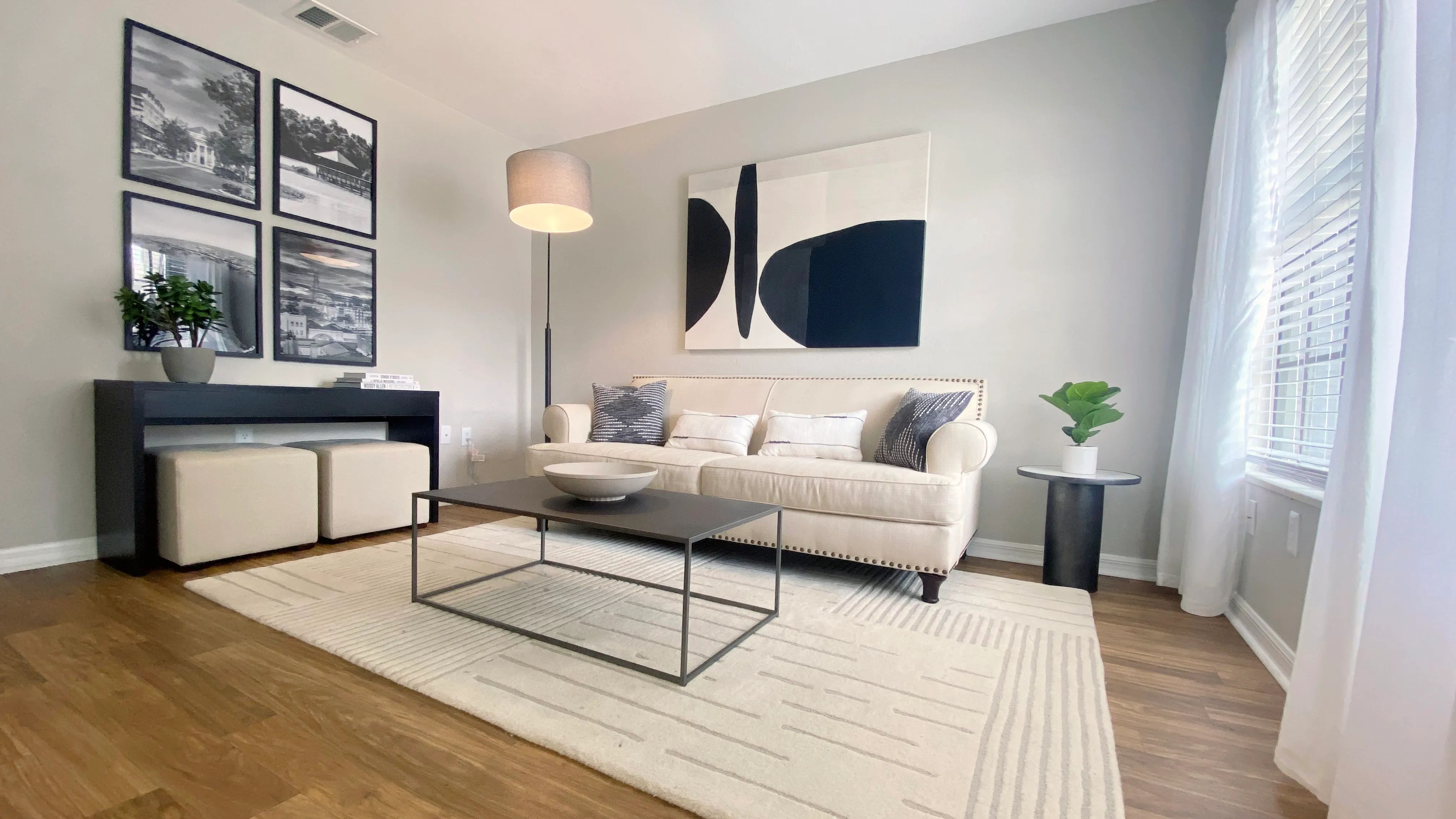 Bask in sunlight in our living rooms with wood-style flooring and expansive windows, creating a bright and airy ambiance. 
