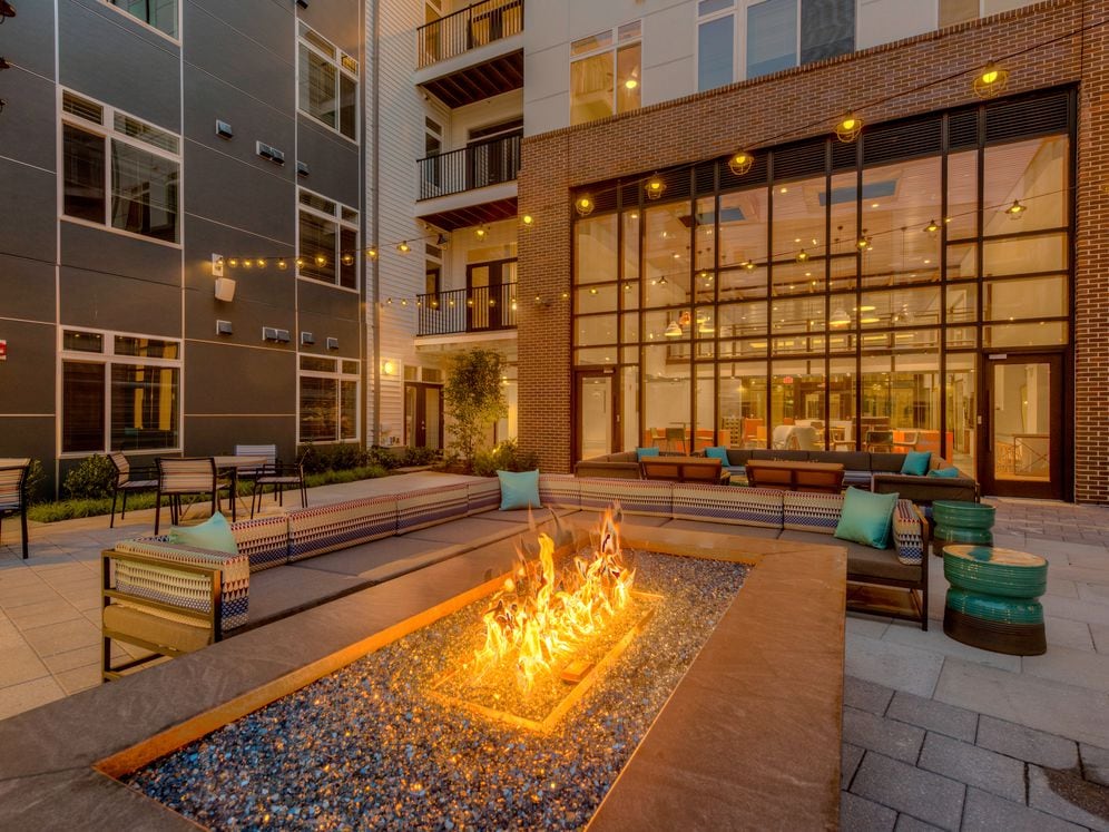 Outdoor chill lounge with fireplace and lounge seating