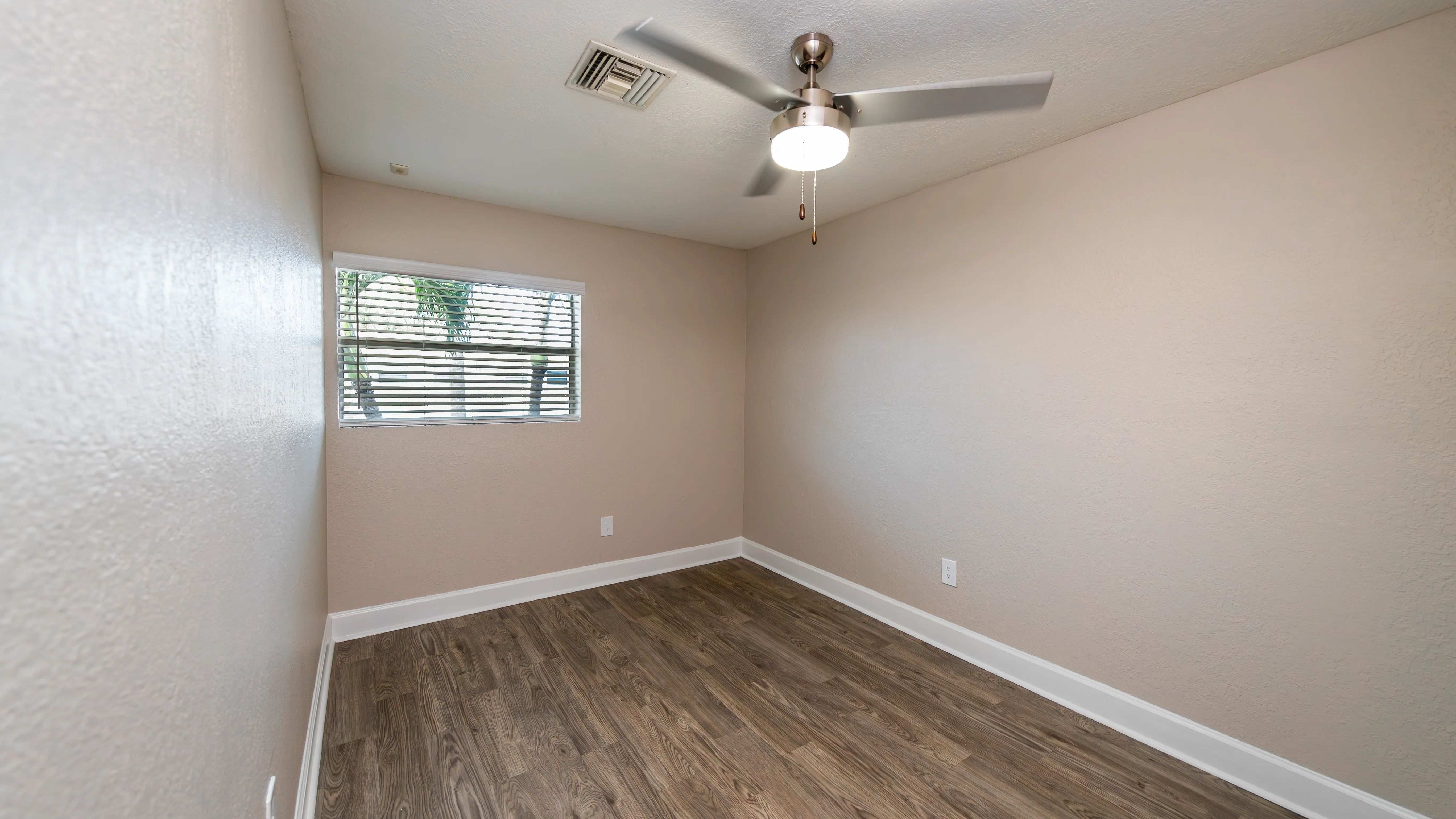 Create your personal haven in a cozy bed space with adjustable privacy blinds and a ceiling fan for customizable lighting.