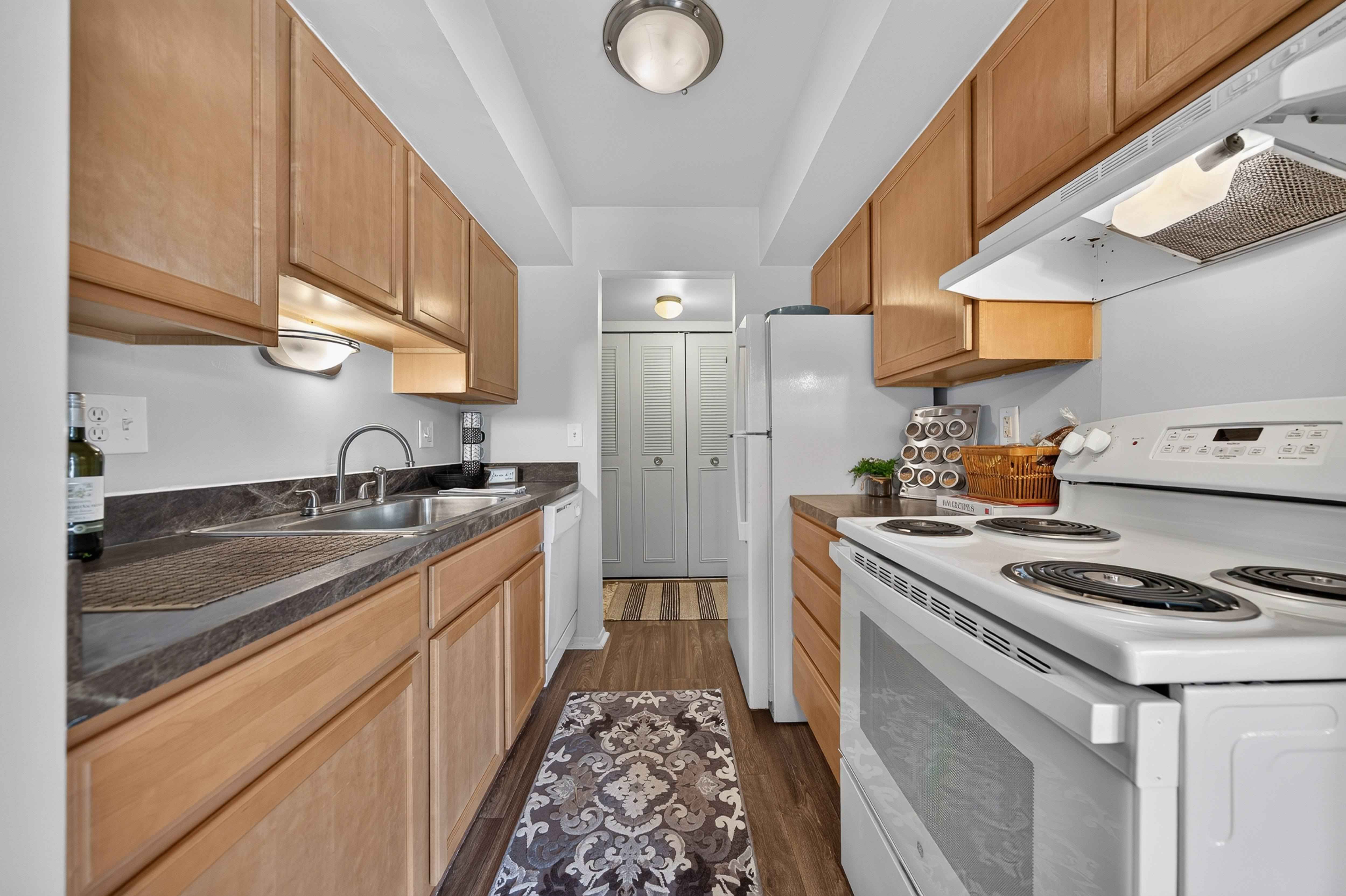 Efficient kitchen at Drawbridge Apartments in Harrison Township, MI.