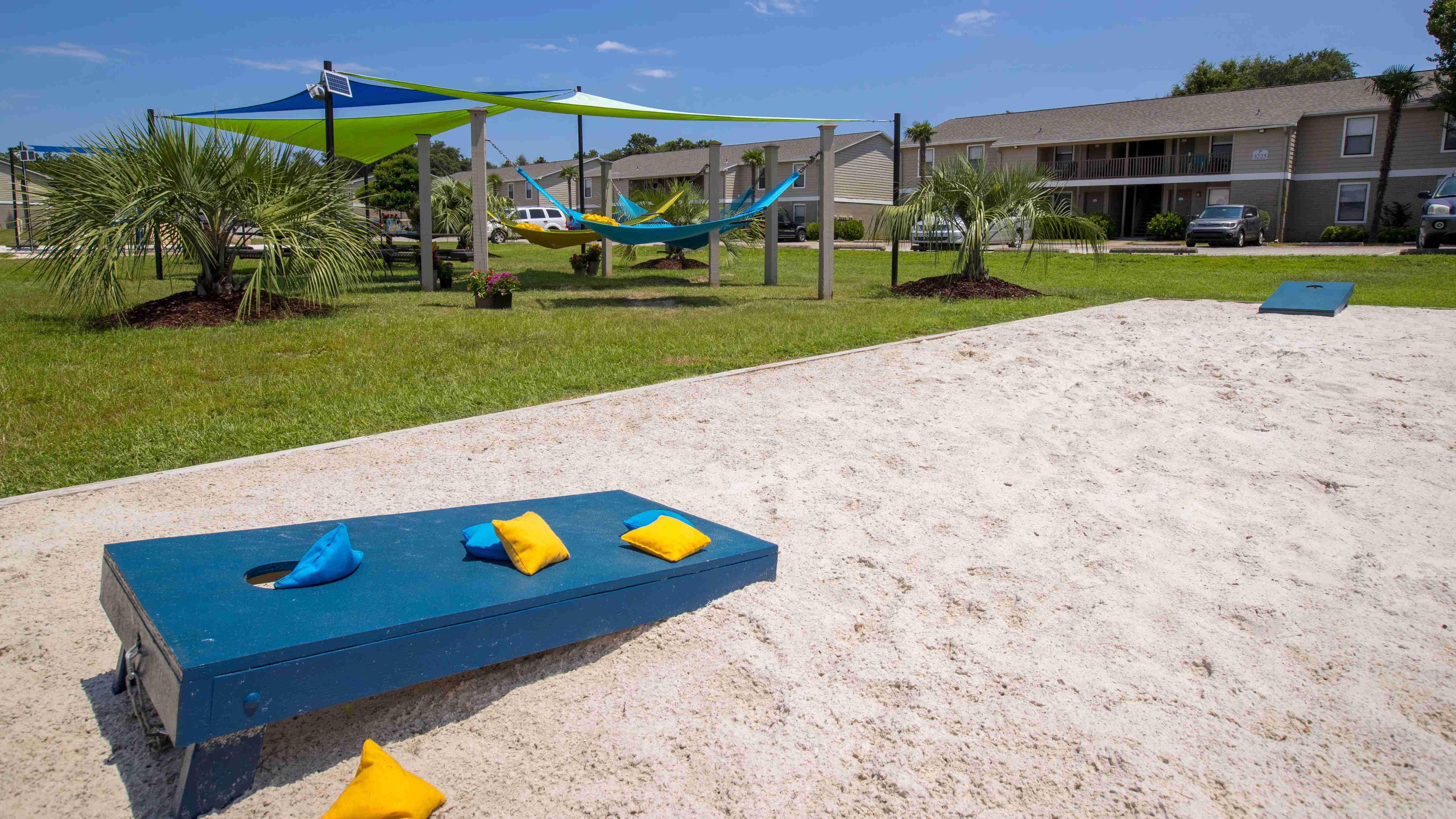 Enjoy a game of cornhole at our designated recreation sandbox.