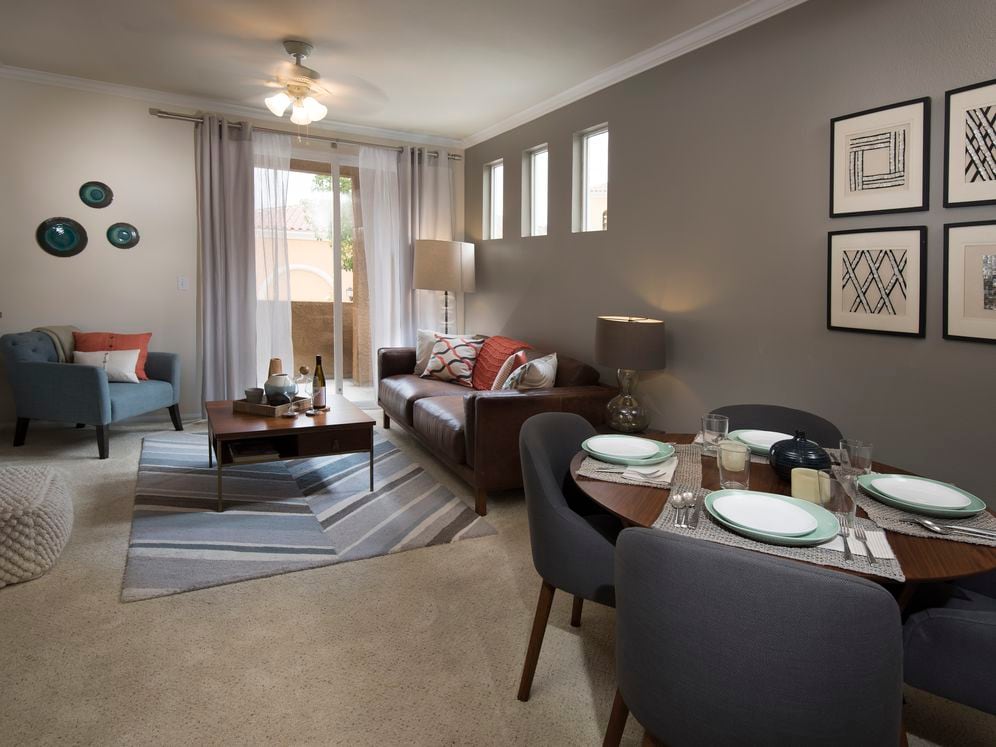 Classic Package I dining and living area with carpeting