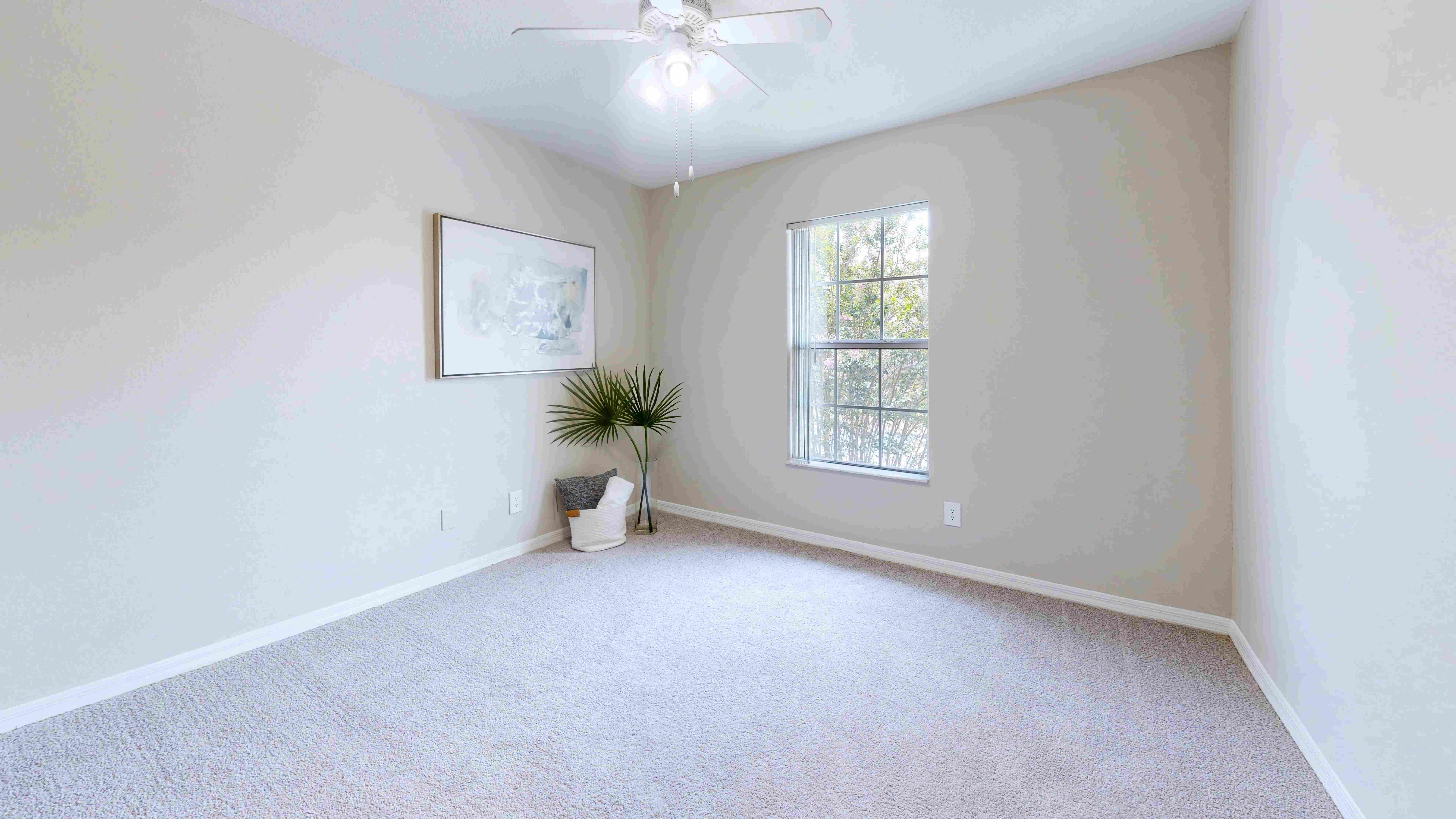 Unwind in our roomy guest bedrooms equipped with multi-speed ceiling fans, designed for your relaxation.