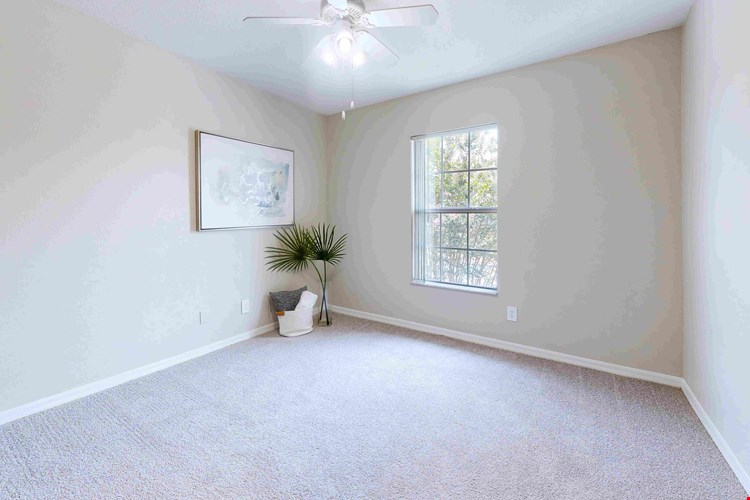 Unwind in our roomy guest bedrooms equipped with multi-speed ceiling fans, designed for your relaxation.