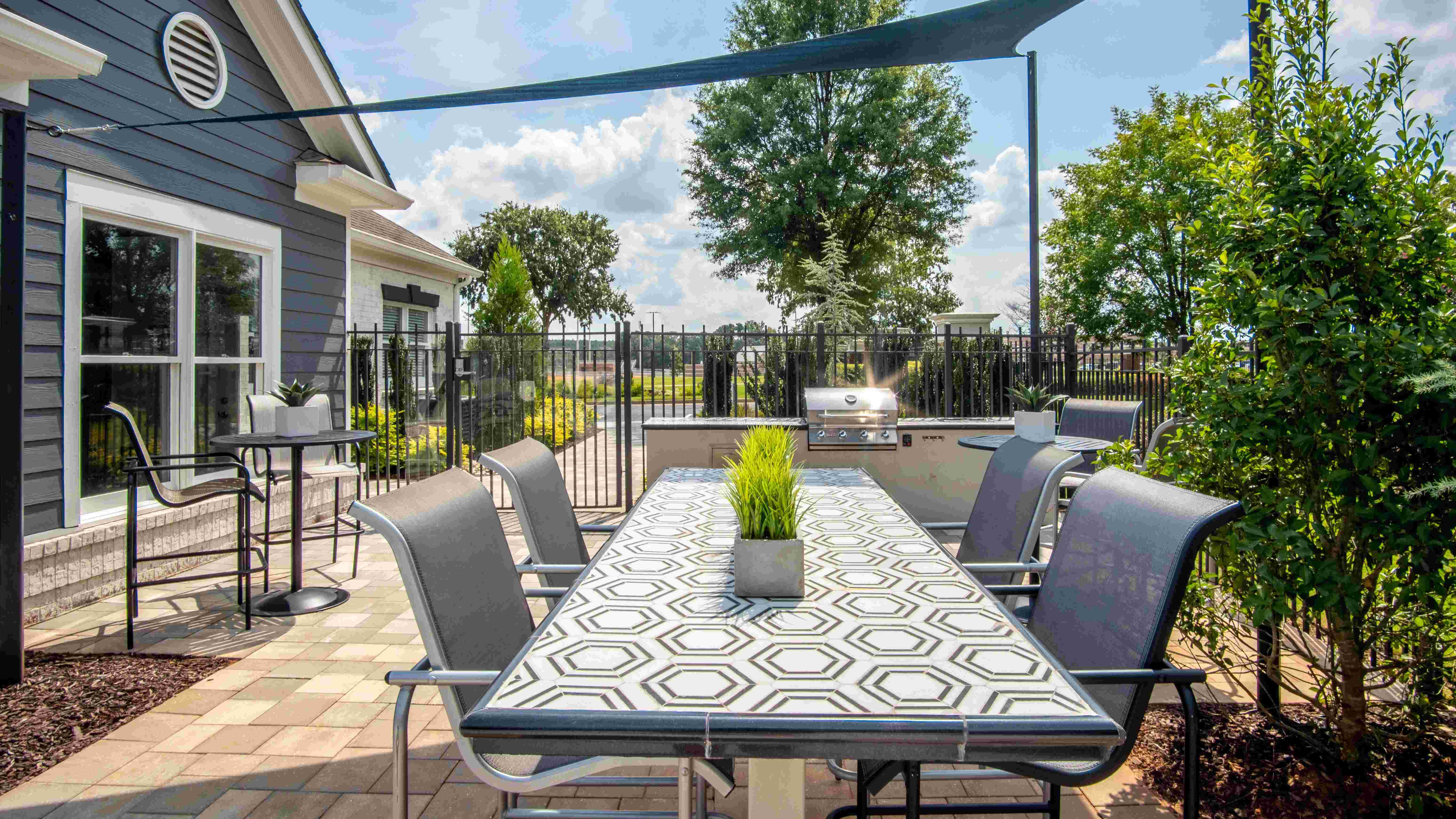 Experience alfresco dining and unforgettable gatherings at our poolside outdoor kitchen!