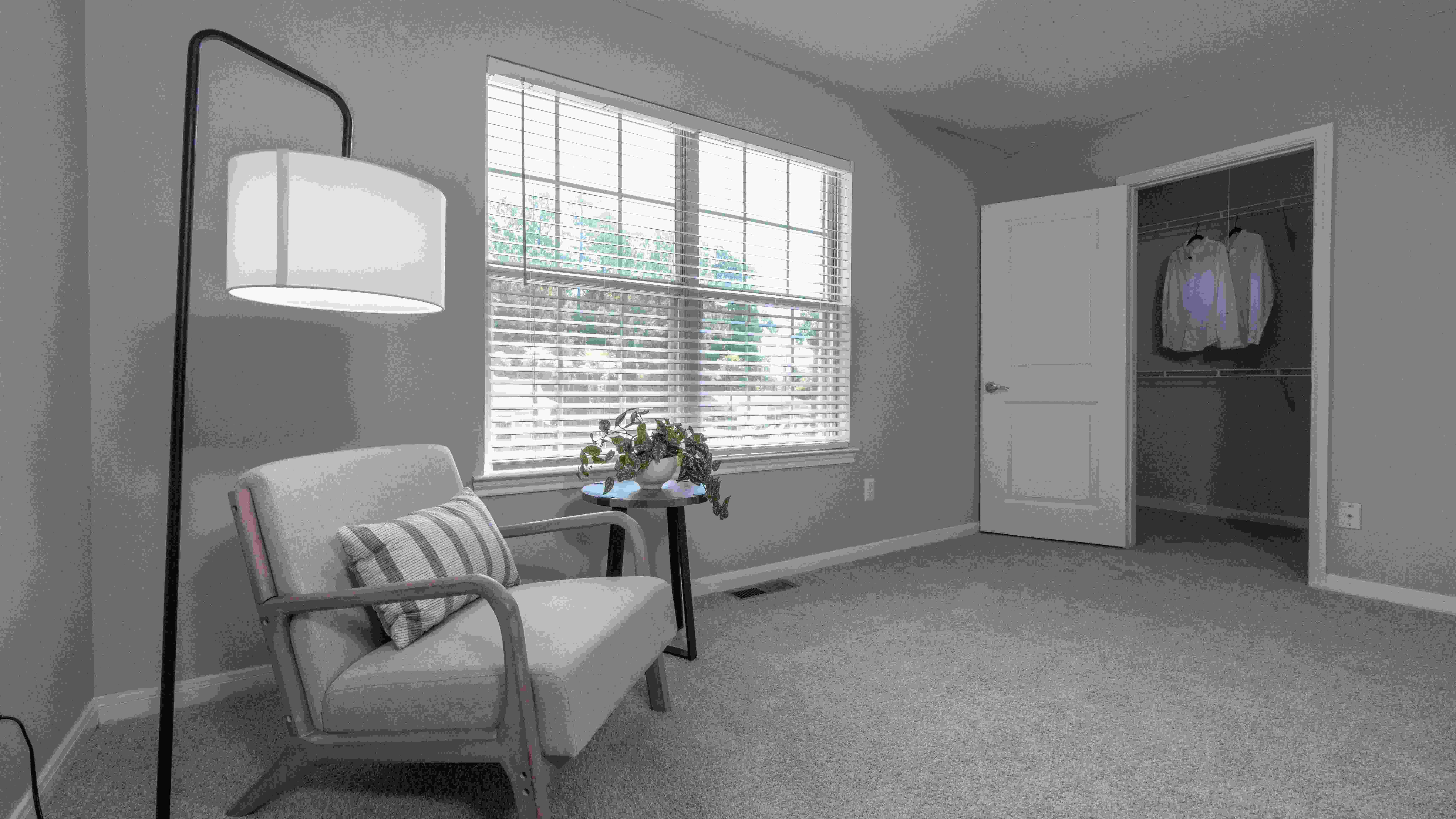 The second bedroom offers ultimate privacy, complete with its 'mini' walk-in closet. 