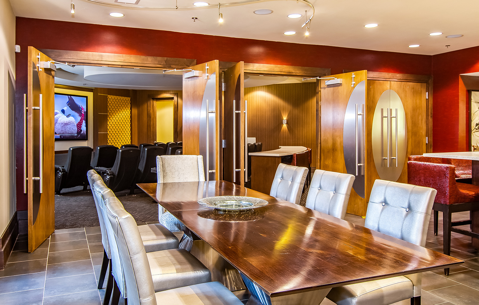 Dining Area and Movie Theater with Surround Sound, Plush Seating, and Popcorn