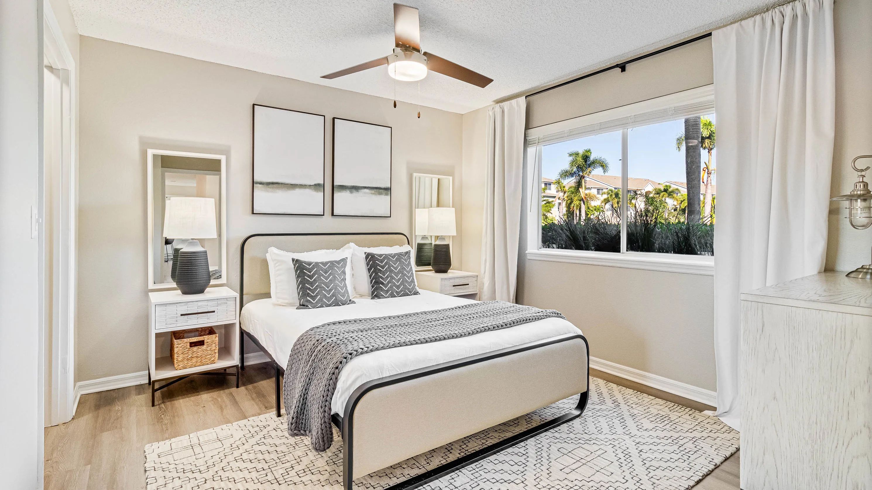 Spacious bedrooms with walk-in closets, large windows, and ceiling fans for ultimate comfort.