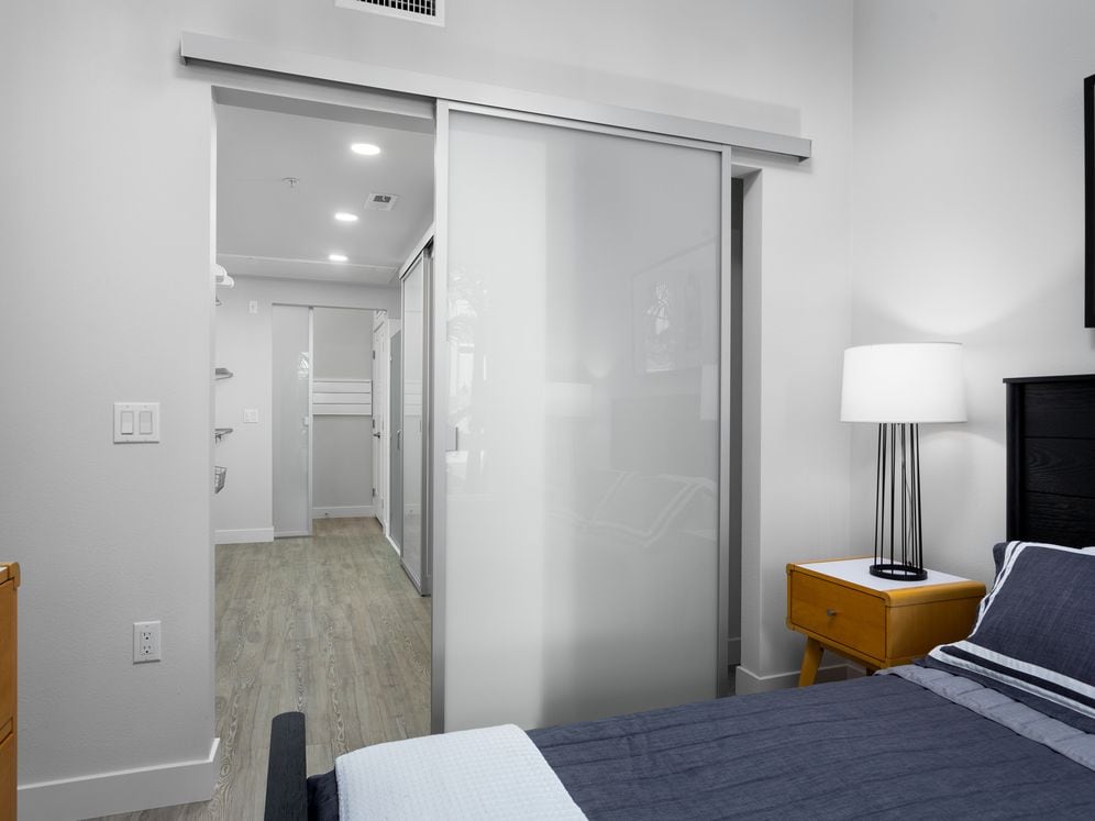 Building B Urban Design bedroom with sliding barn door