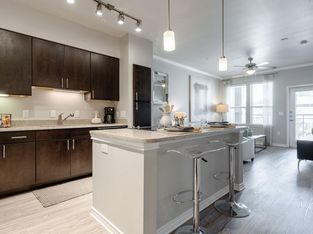 Kitchen and living room with hard surface flooring