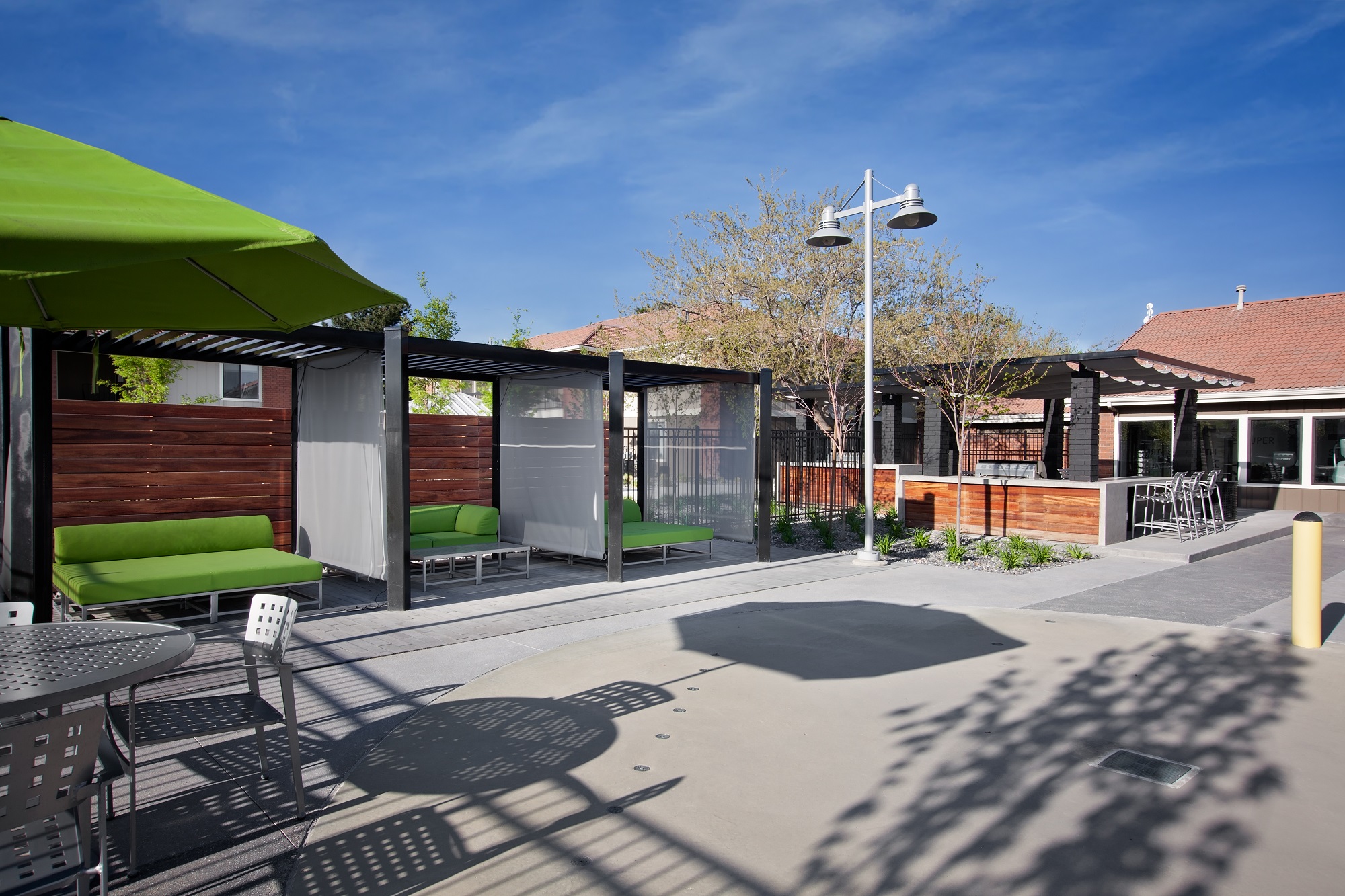 West Valley City, UT Enclave at Redwood apartments courtyard seating are