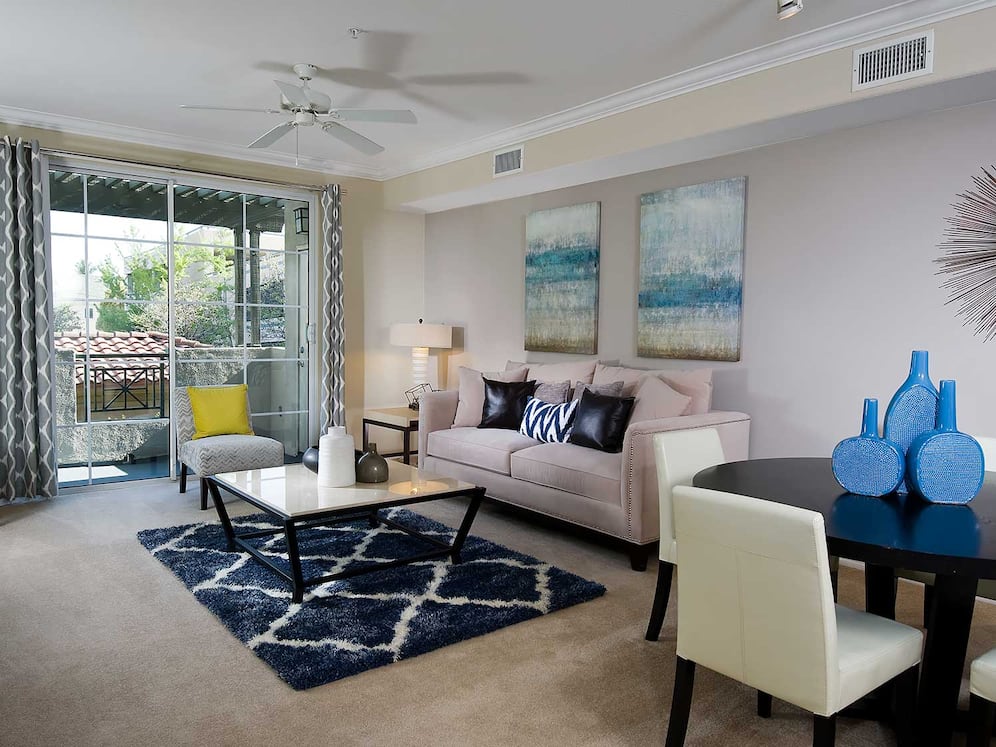 Classic Package I dining and living room with carpet