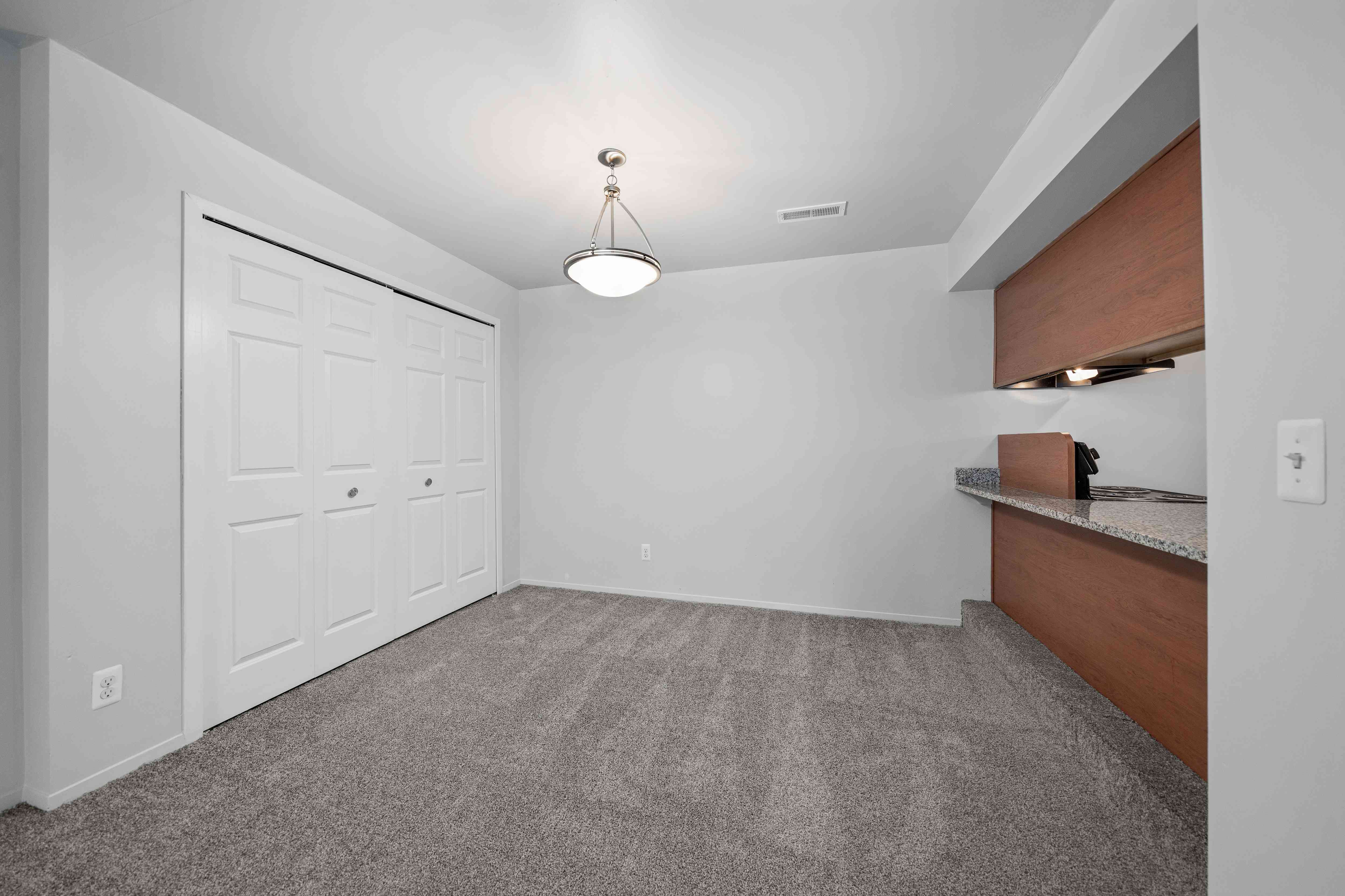 Cozy dining room space at Woodland Villa Apartments in Westland, MI.