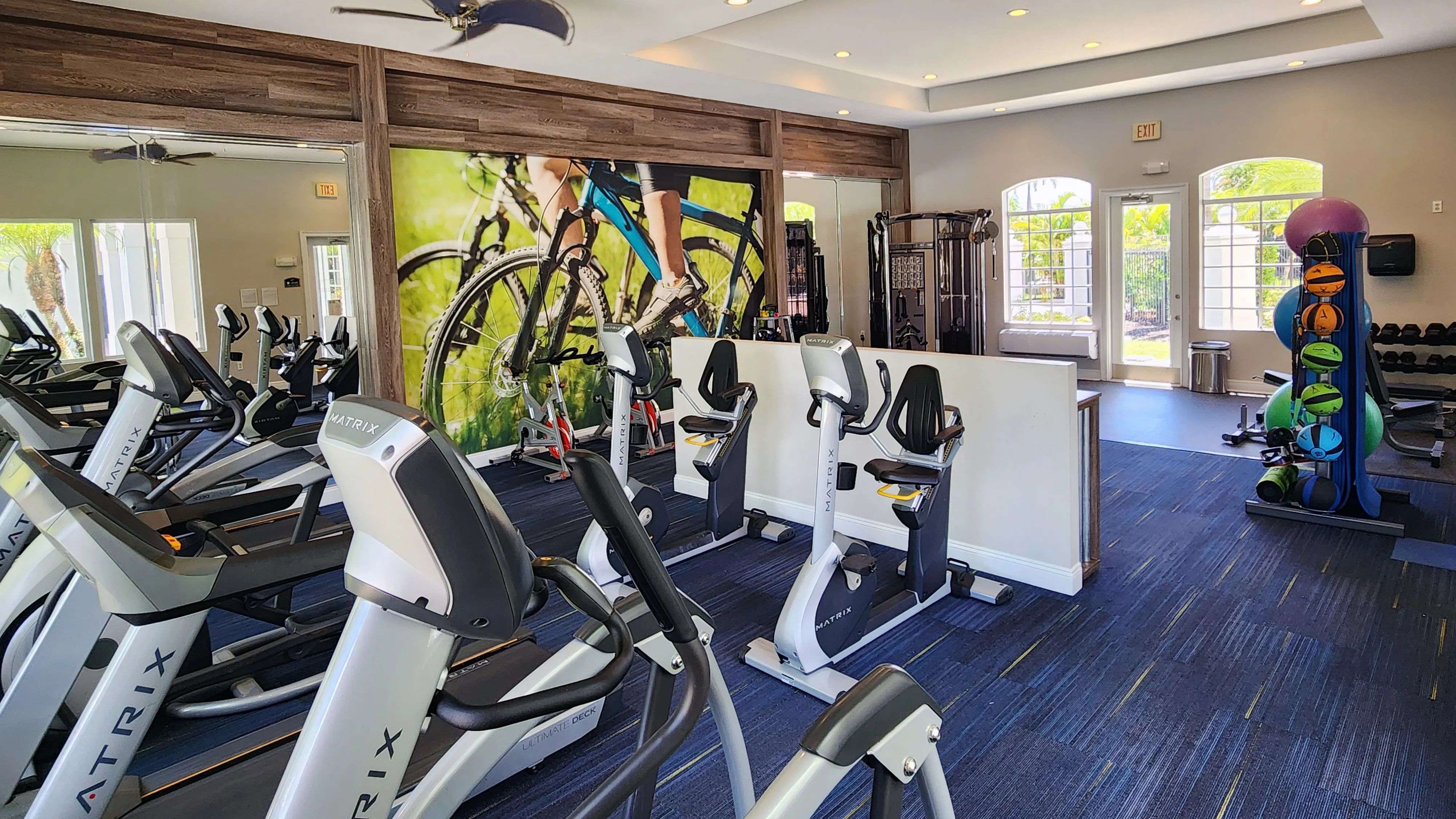 Stay fit and active in our fully equipped fitness center, featuring state-of-the-art exercise equipment and vibrant decor.
