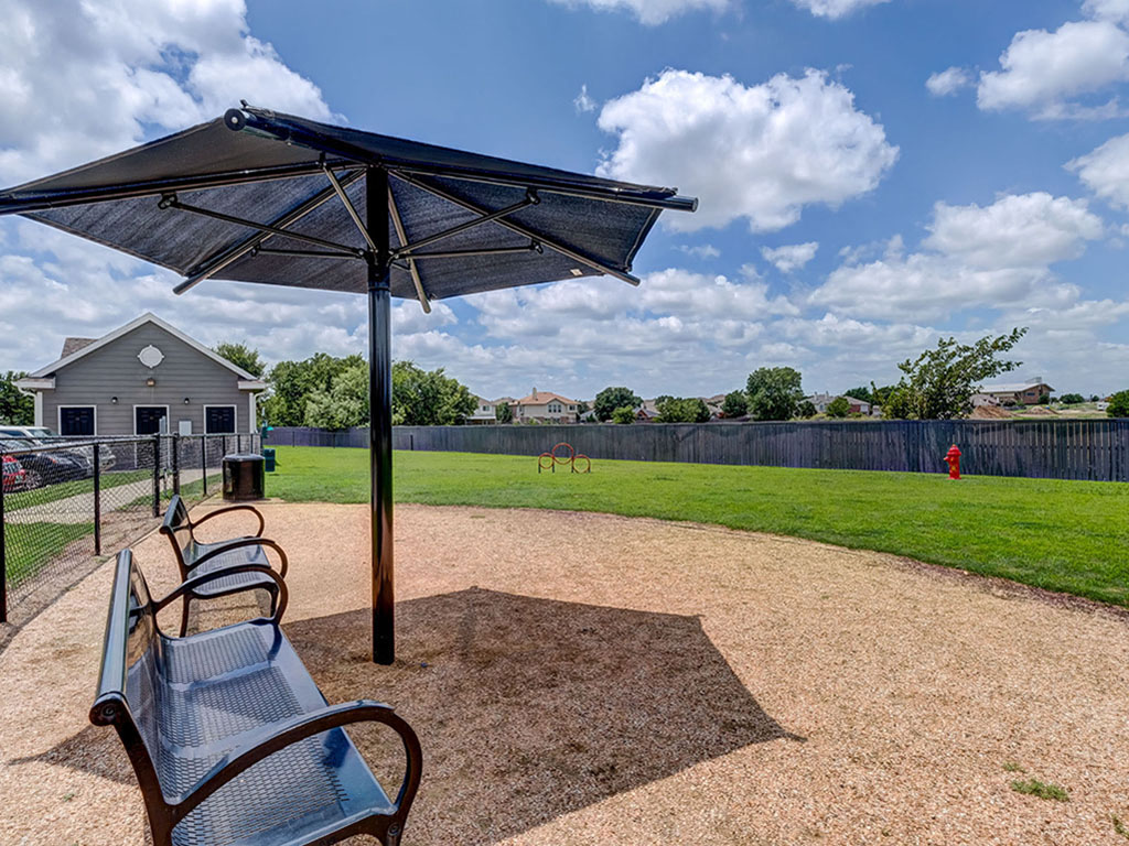 Dog Park with agility equipment and bench seating