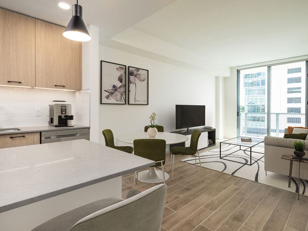 Dining and living room with hard surface flooring