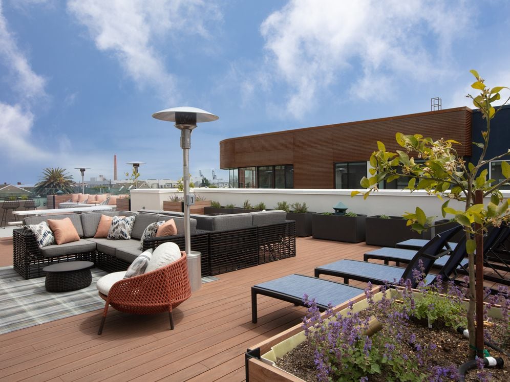 Rooftop deck with lounge seating and fireplace