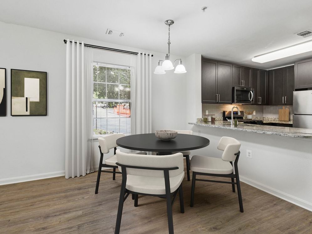 Renovated Package I kitchen and dining area with hard surface flooring