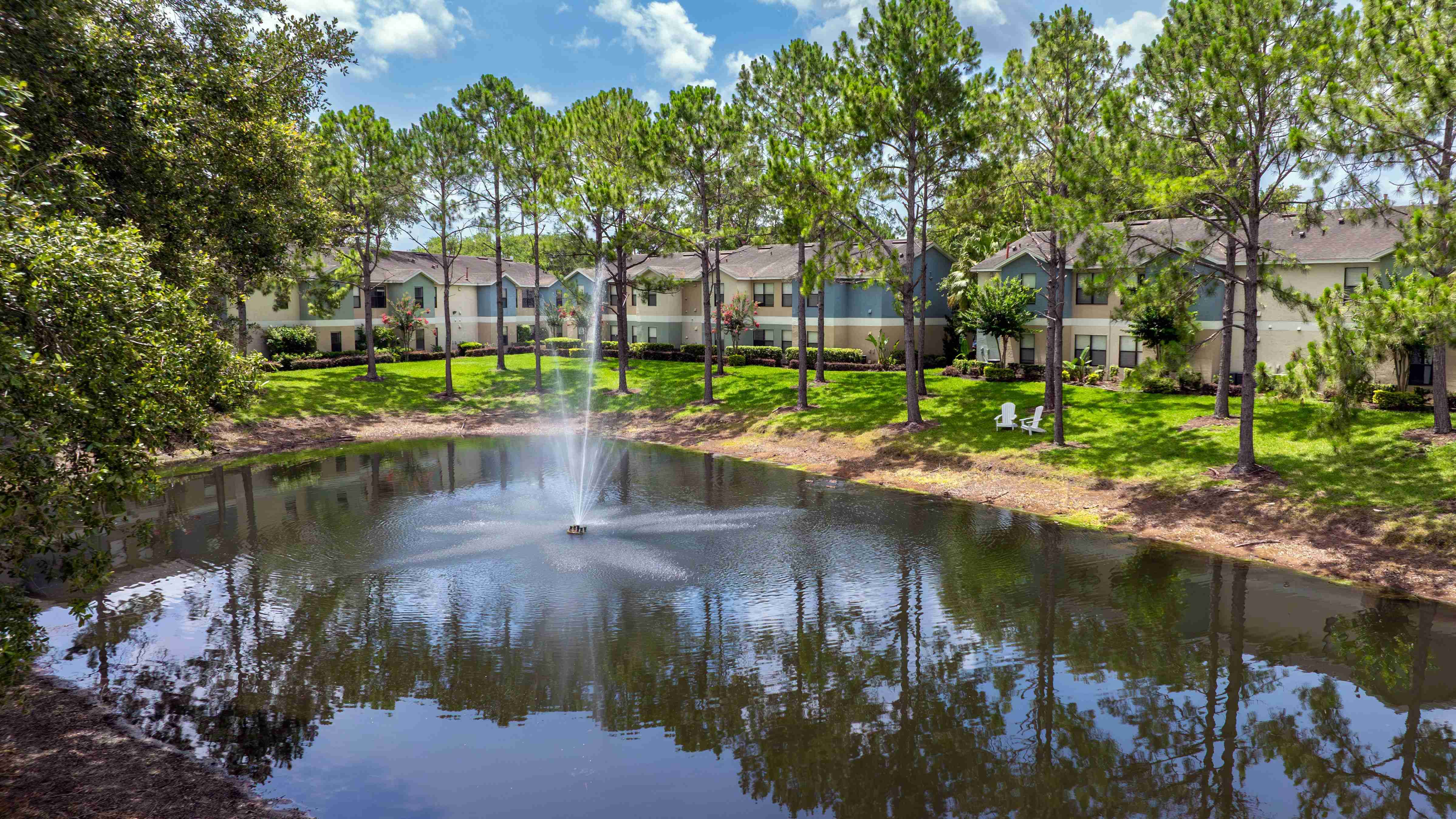 Enjoy the relaxing sounds of the fountain and the serene beauty of nature, right outside your door at Harper Grand.