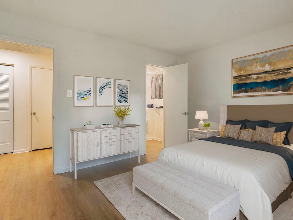 Upgraded Package II bedroom with hard surface flooring and walk-in closet