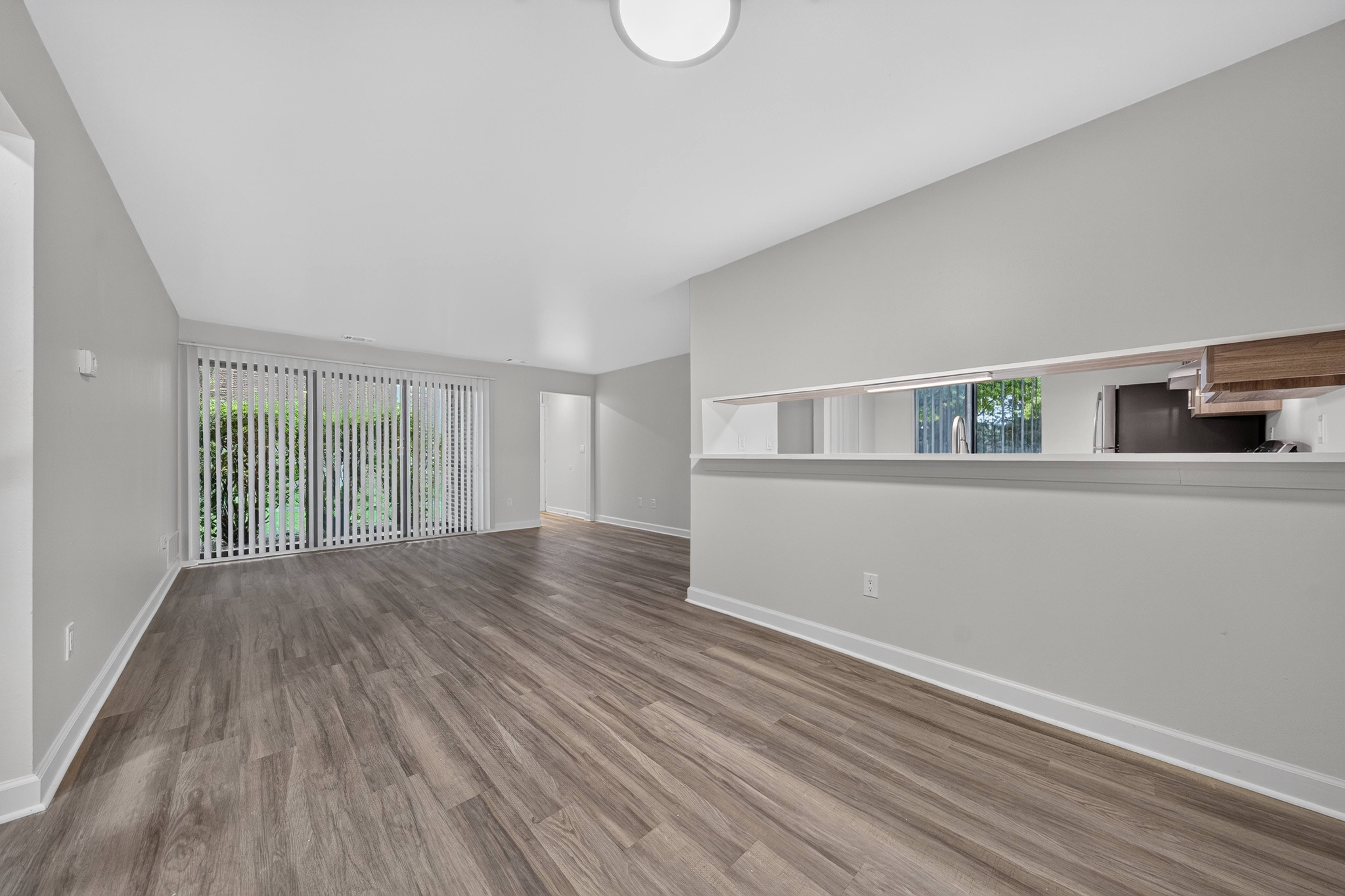 Open and airy dining and living room at Park Lane Apartments in Southfield, MI.