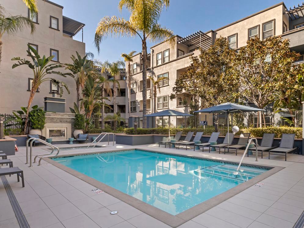 Swimming pool and spa with lounge seating