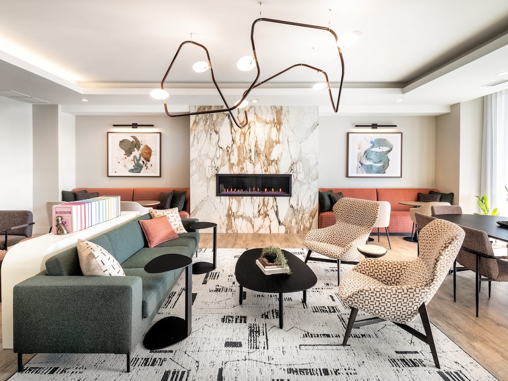Resident lounge with fireplace and ample seating