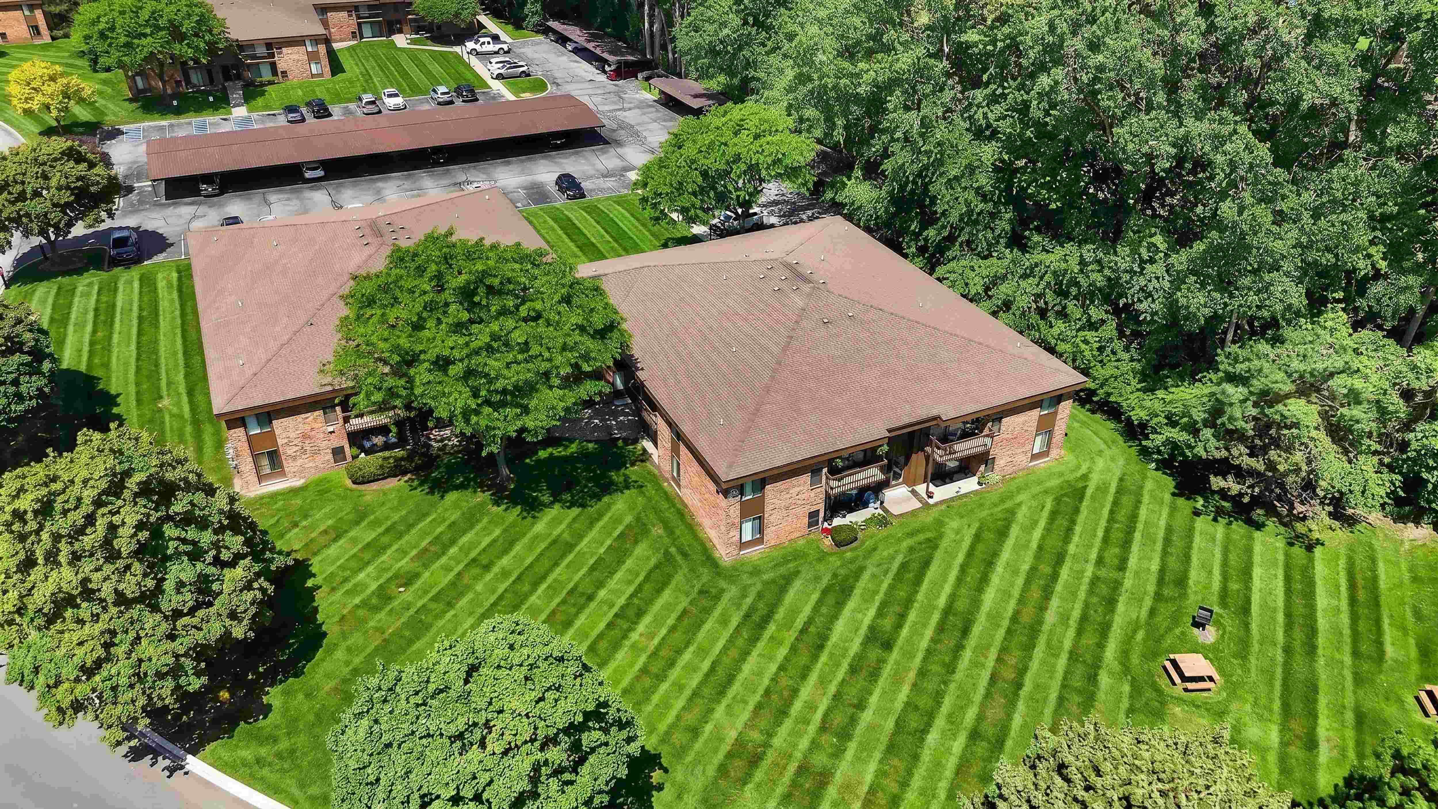 Lush green yard at Eastwood Village Apartments in Clinton Township, MI.