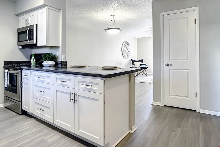 Select floor plans feature a breakfast bar, allowing kitchen view overlooks into the living area - perfect for entertaining and sunny wake ups.