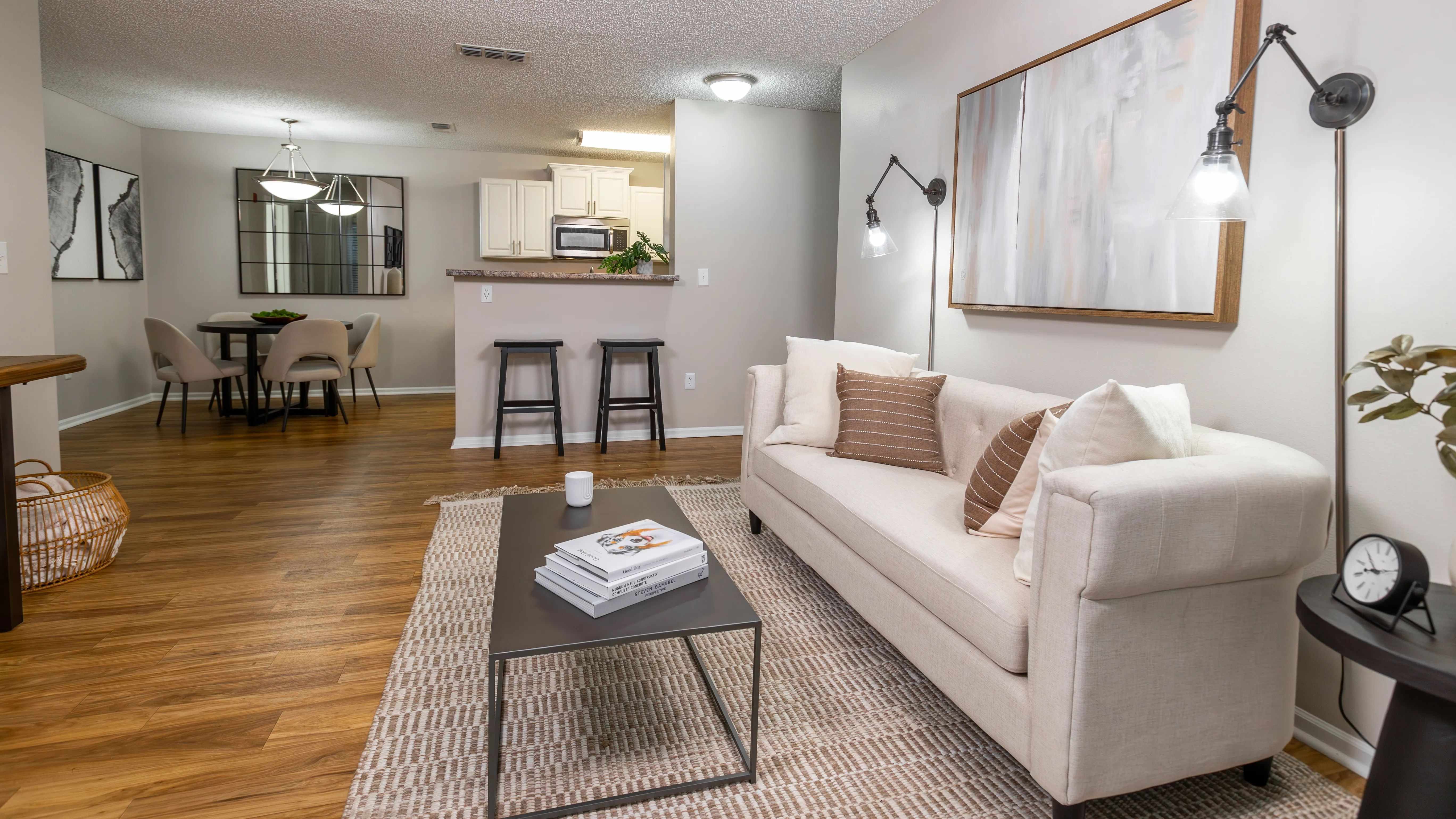 Spacious open-concept layouts featuring a modern living room, chic dining space, and breakfast bar—perfect for hosting or relaxing at home.