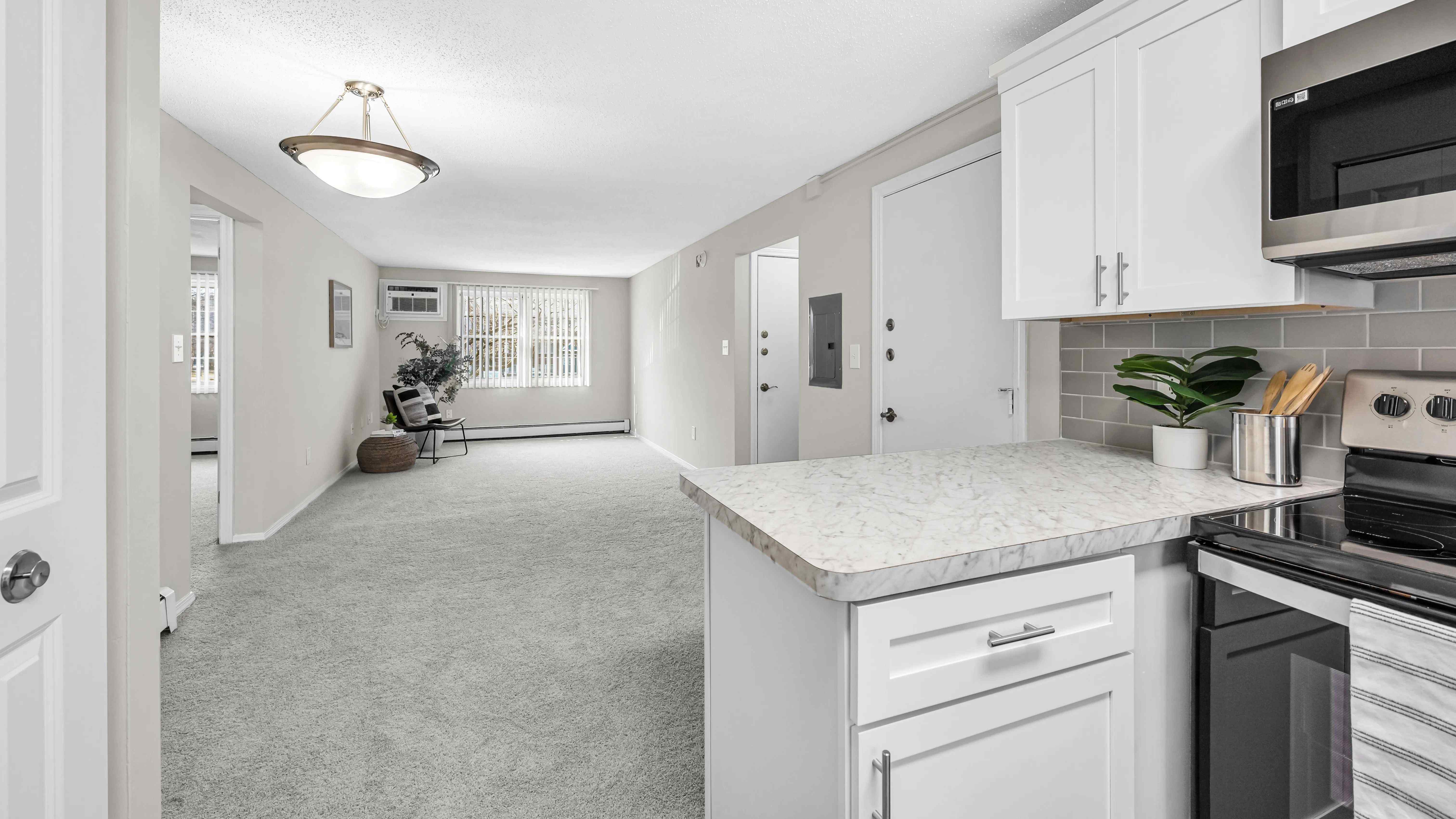 Some kitchens boast a charming breakfast bar, perfect for leisurely mornings. 