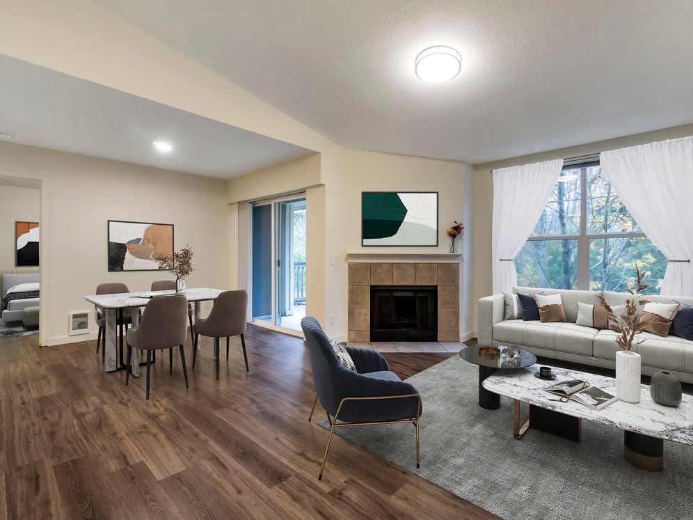 Renovated Package I dining and living room with hard surface flooring