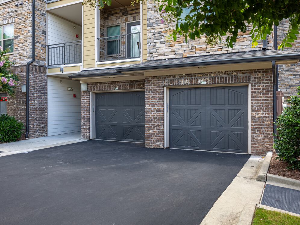 Building exterior with attached parking garages