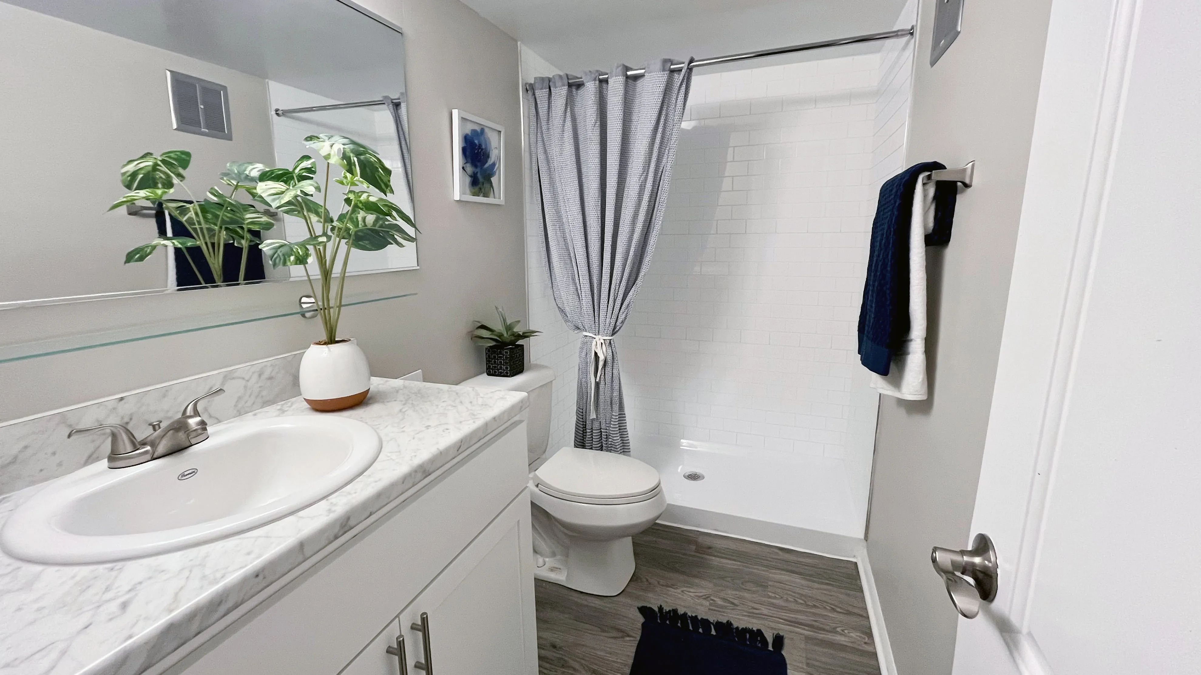 Select bathrooms feature a walk-in shower offering a modern and luxurious allure to your personal space.