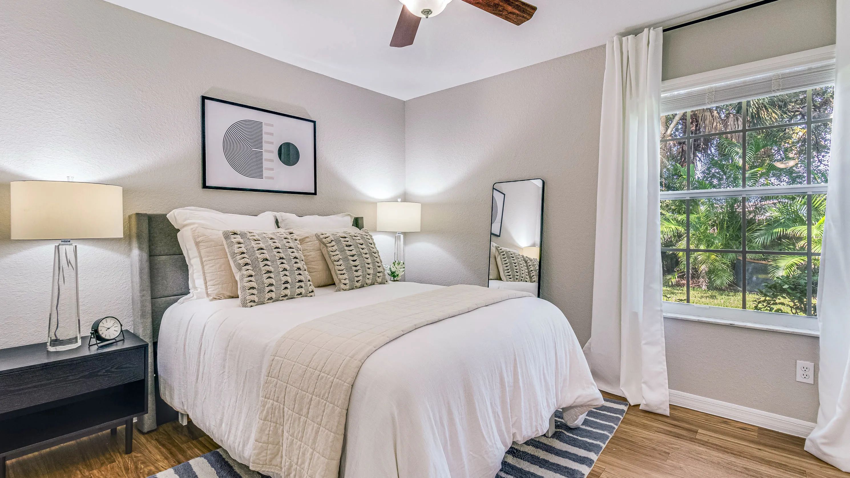 Step into an oversized guest bedroom—bright and airy!