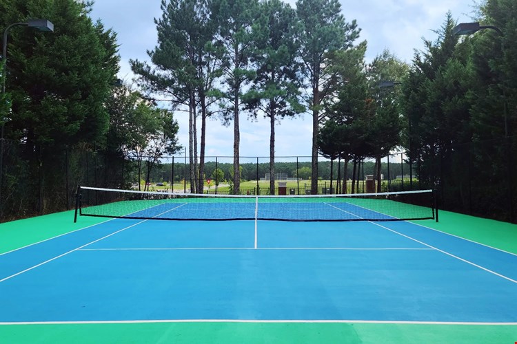 Experience the thrill of the game and unleash your competitive spirit on our pristine tennis court.