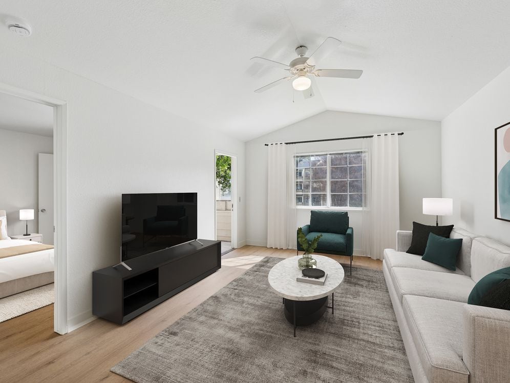 Upgraded Collection living room with hard surface flooring