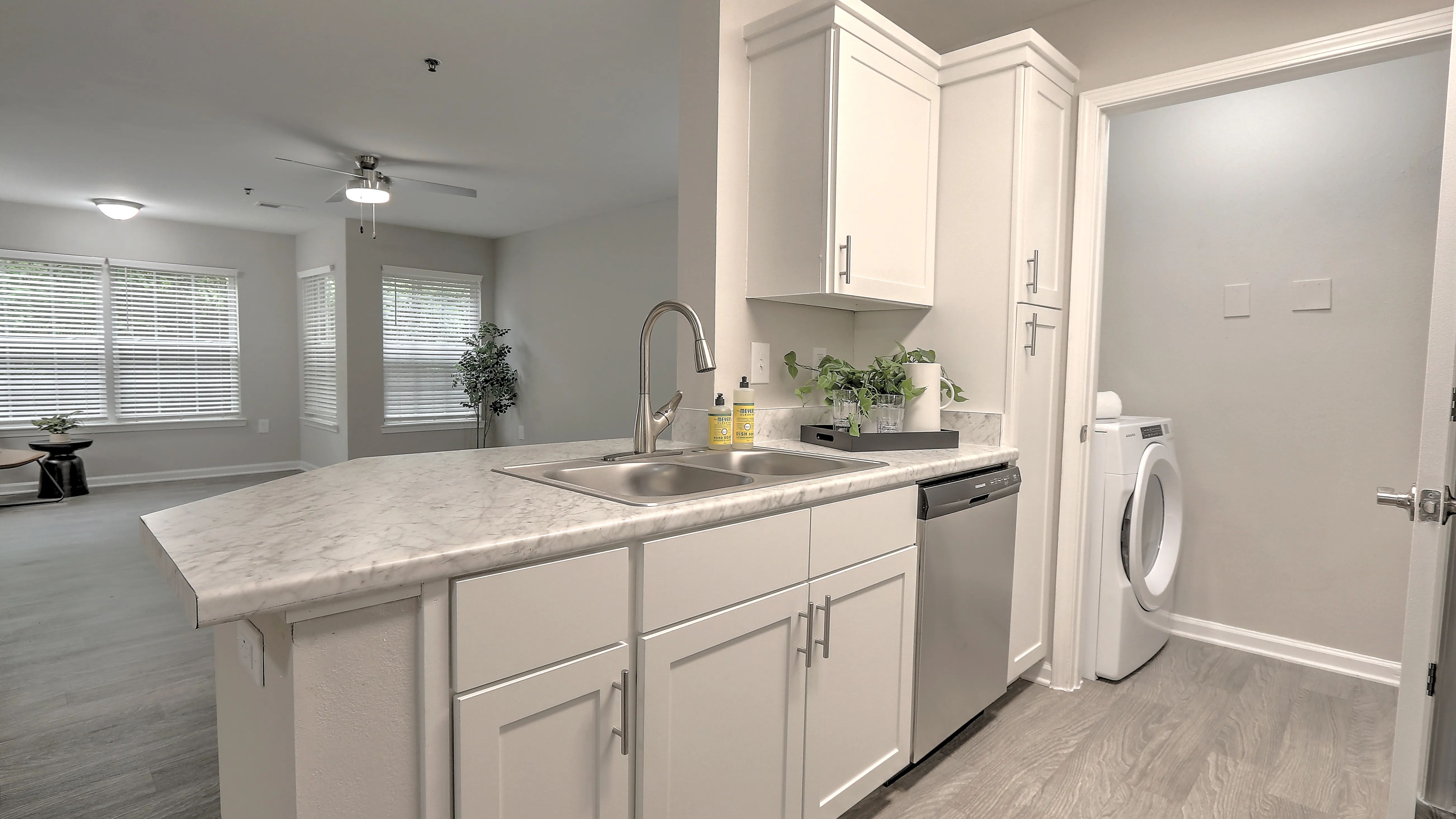 Kitchens designed for entertaining with luxury countertops and bar seating.